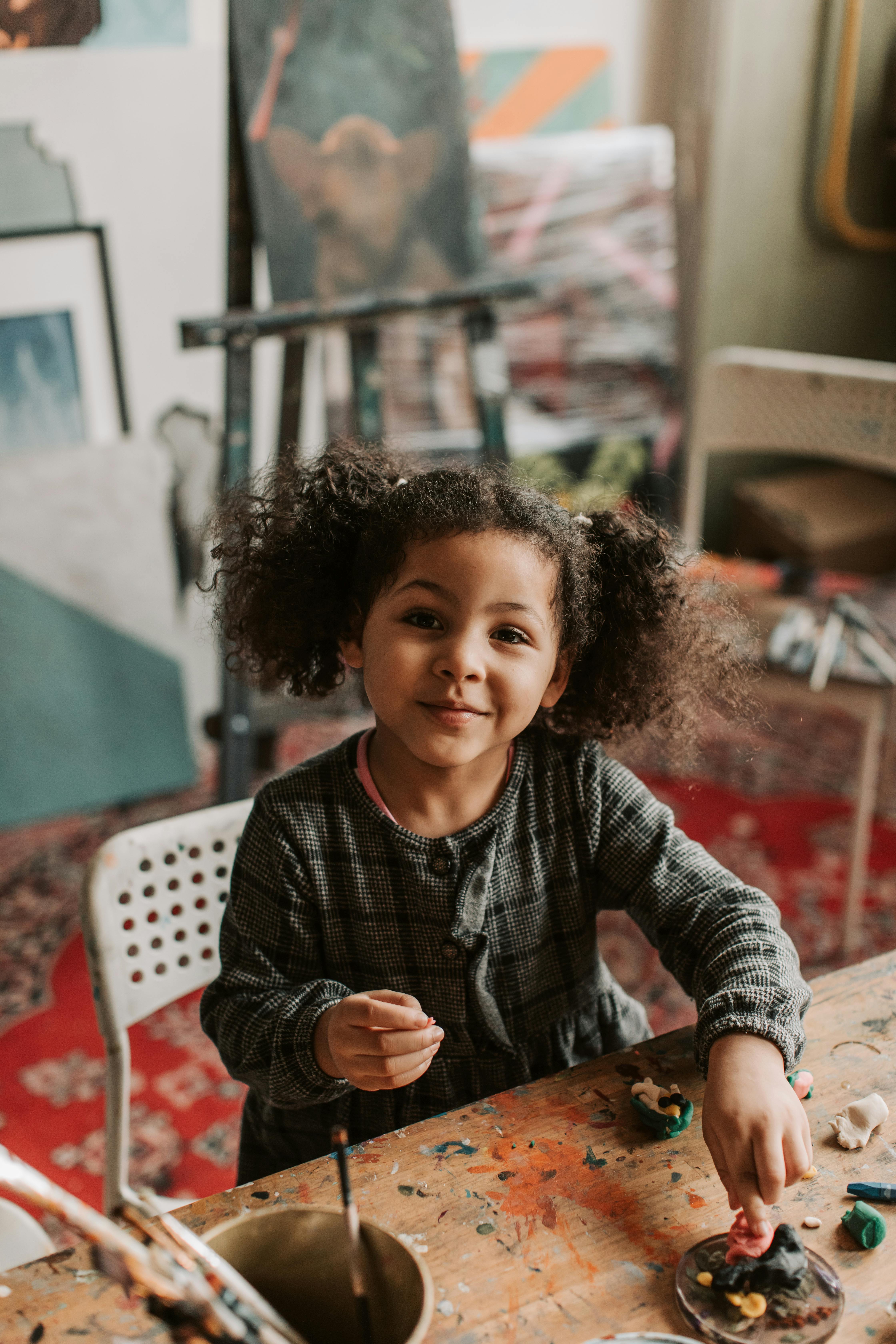 Little Girl Creating Art in Studio