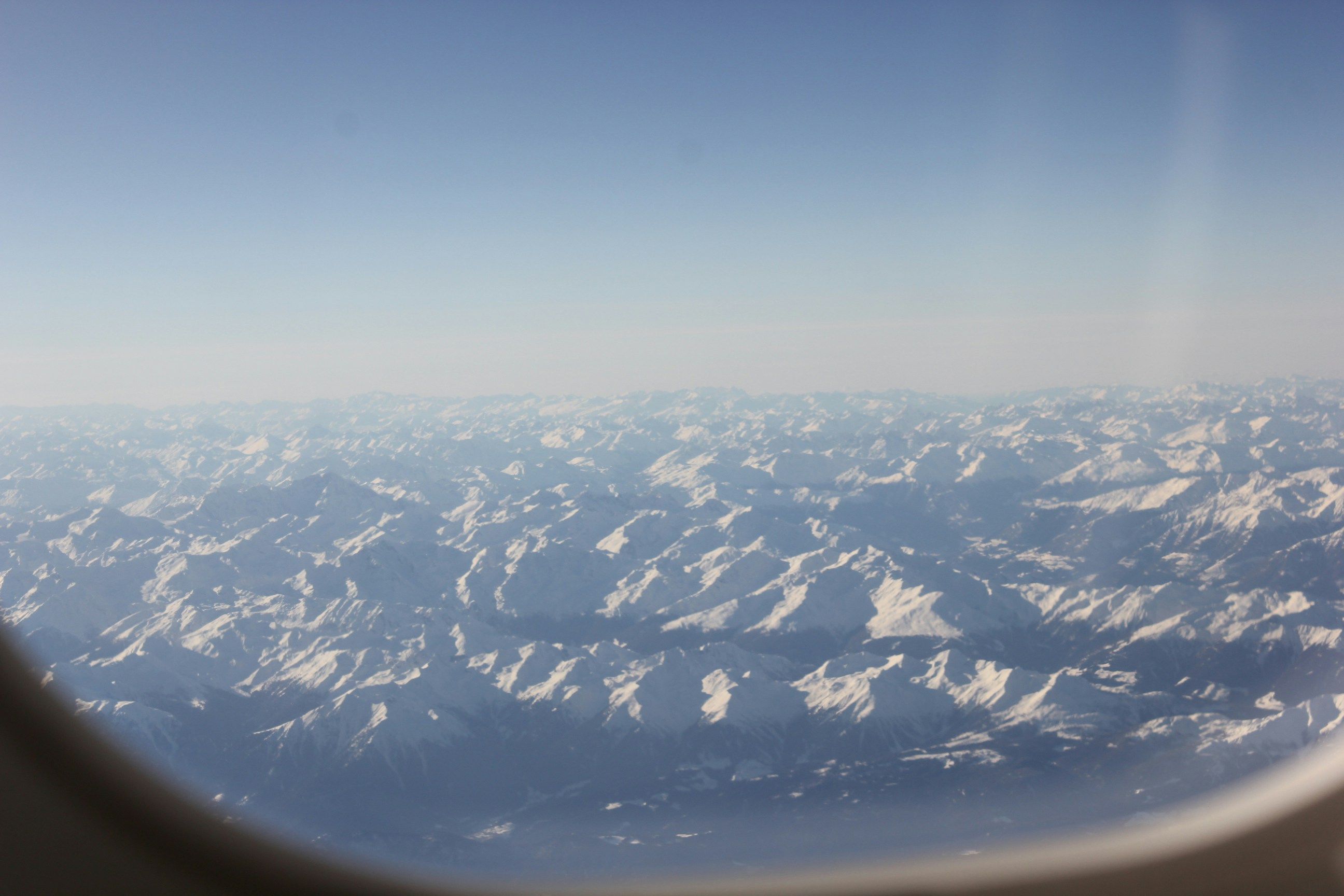 Snow Mountains Seen From Airplane Window