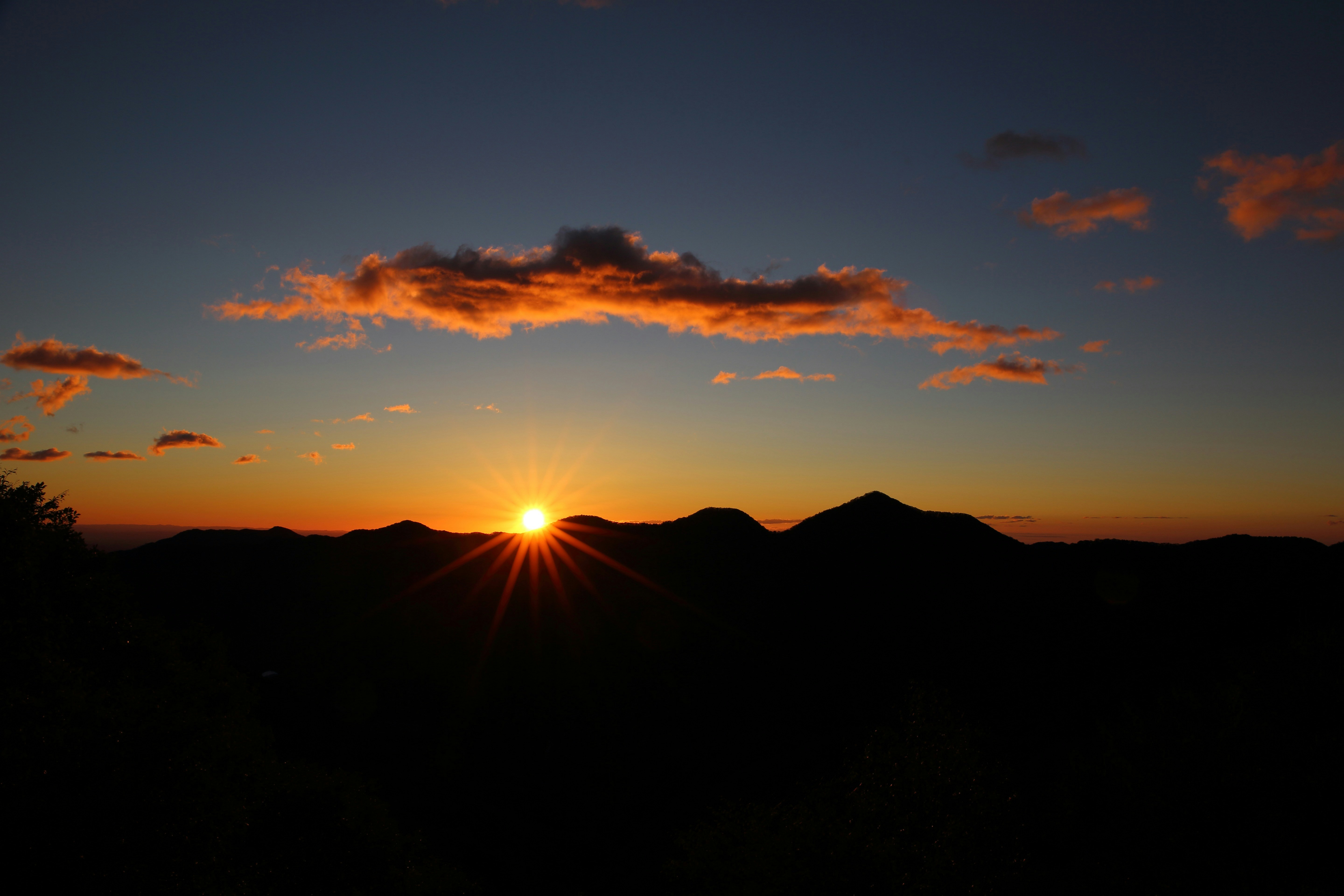 Sunset Over Mountain Ridges