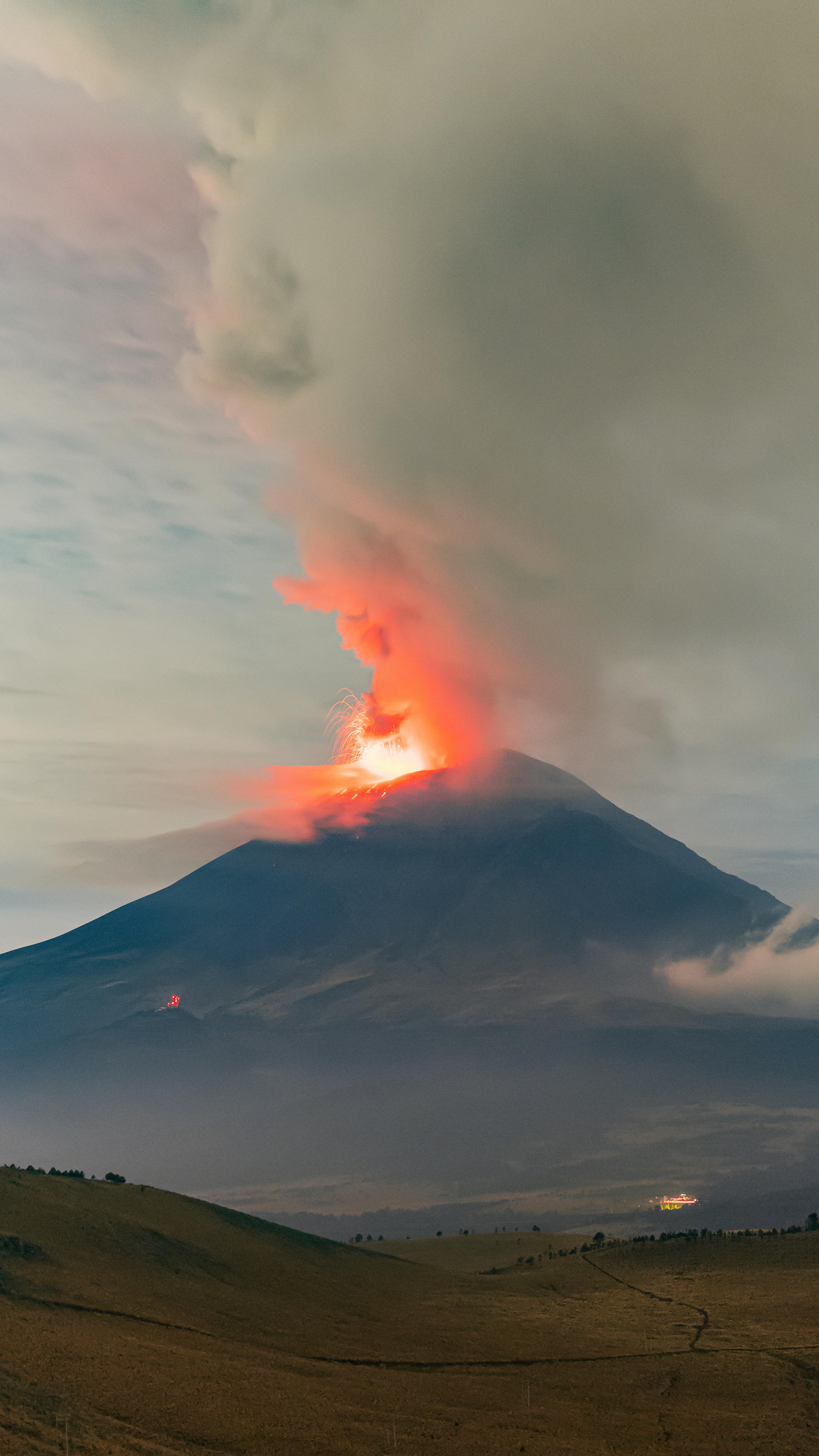 Erupting Volcano At Dusk