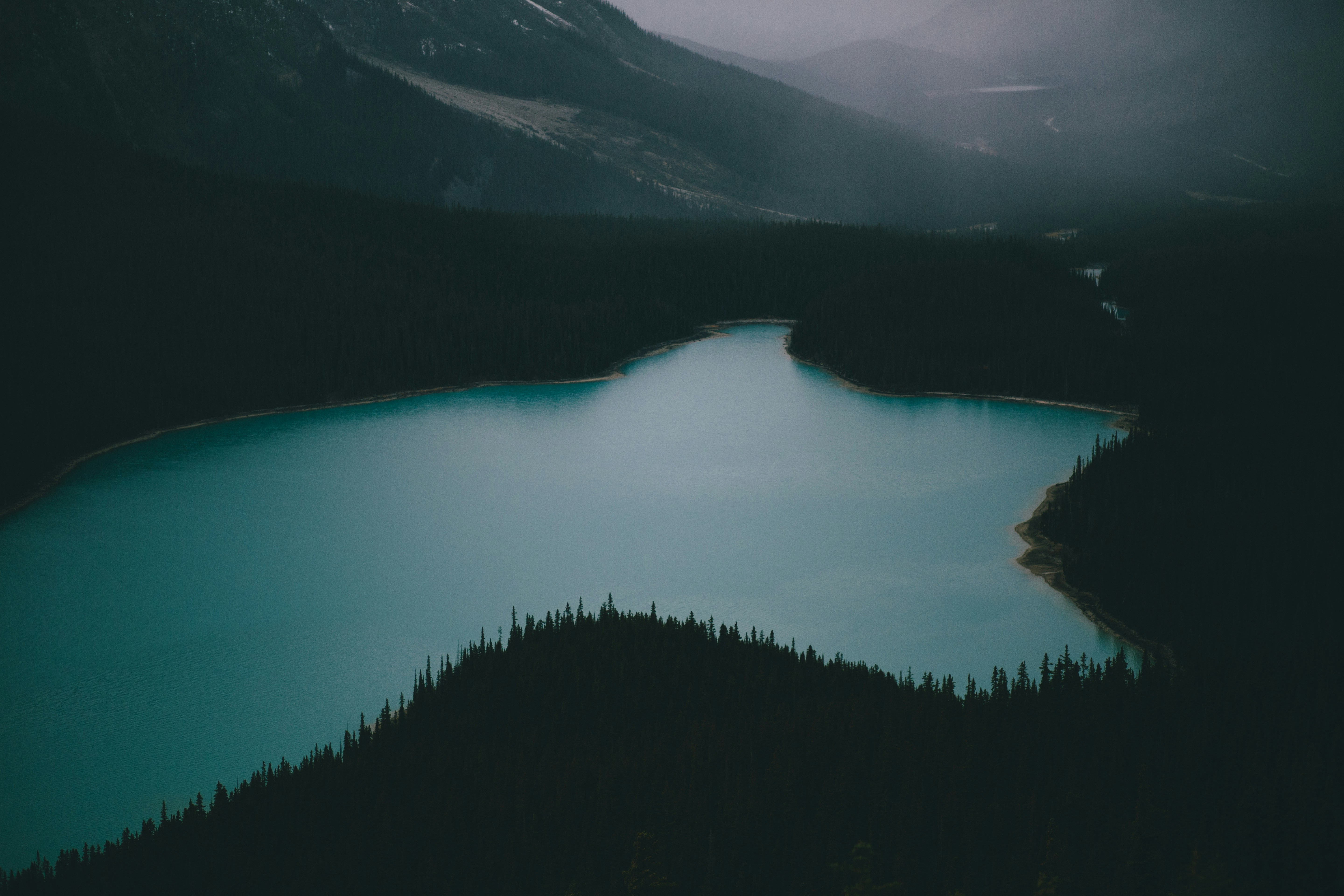 Turquoise Lake in Misty Mountains