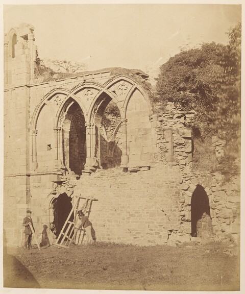 Workers Restoring Old Stone Ruins