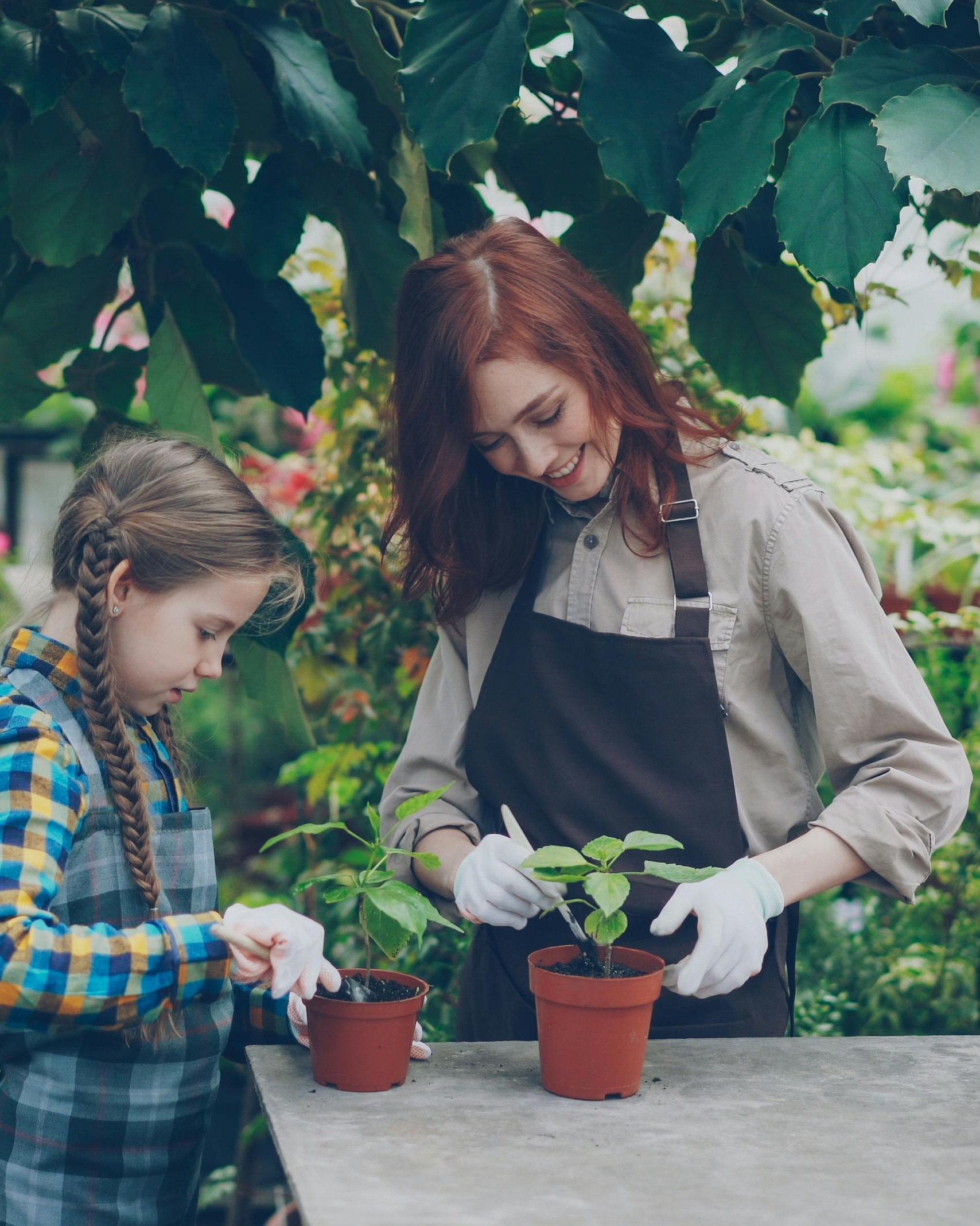 Woman and Girl Gardening Together