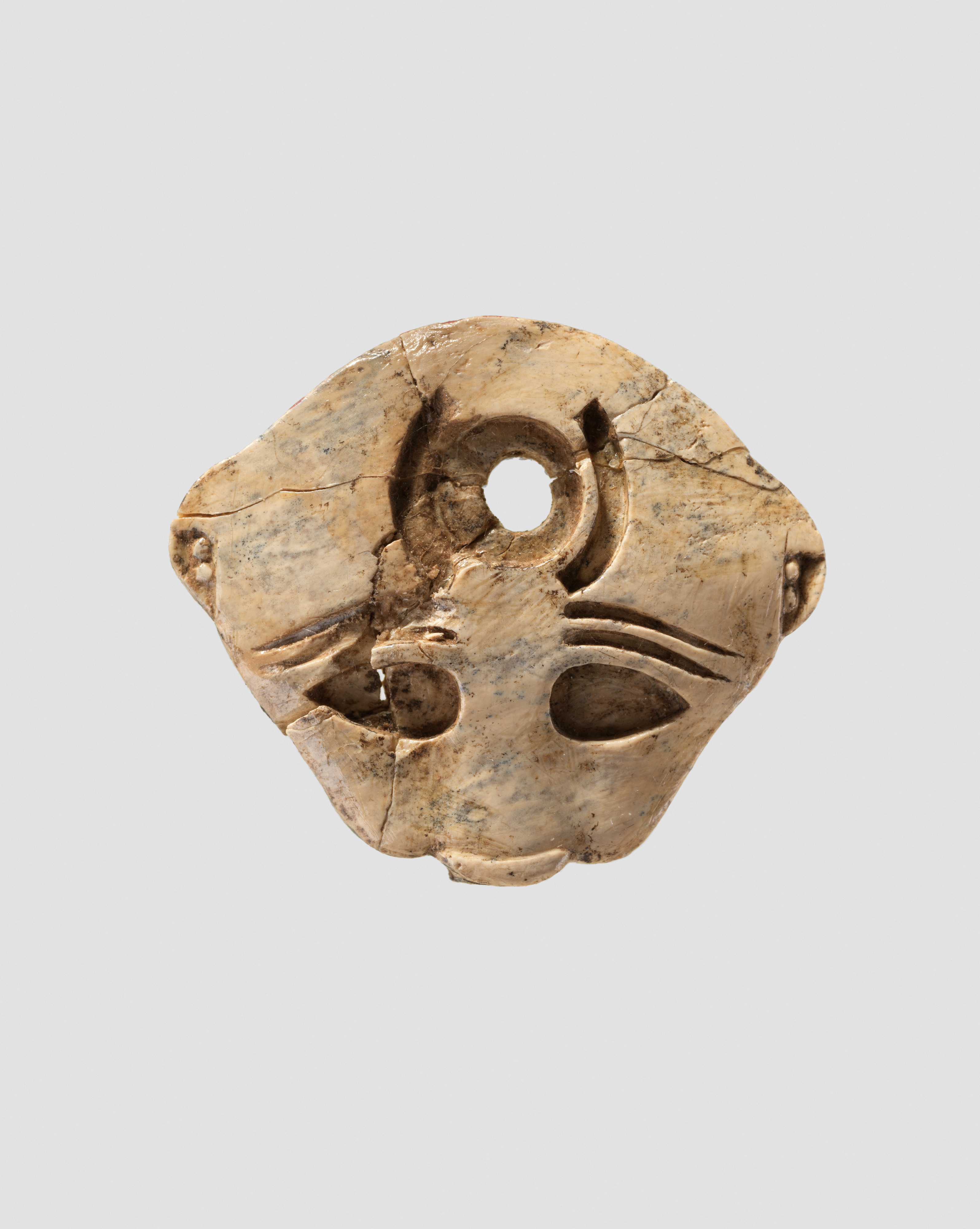 Ancient Carved Bone Face Artifact