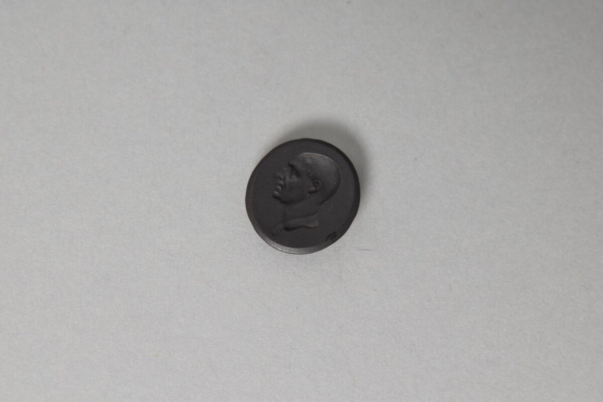 Black Medallion With Bald Man Profile