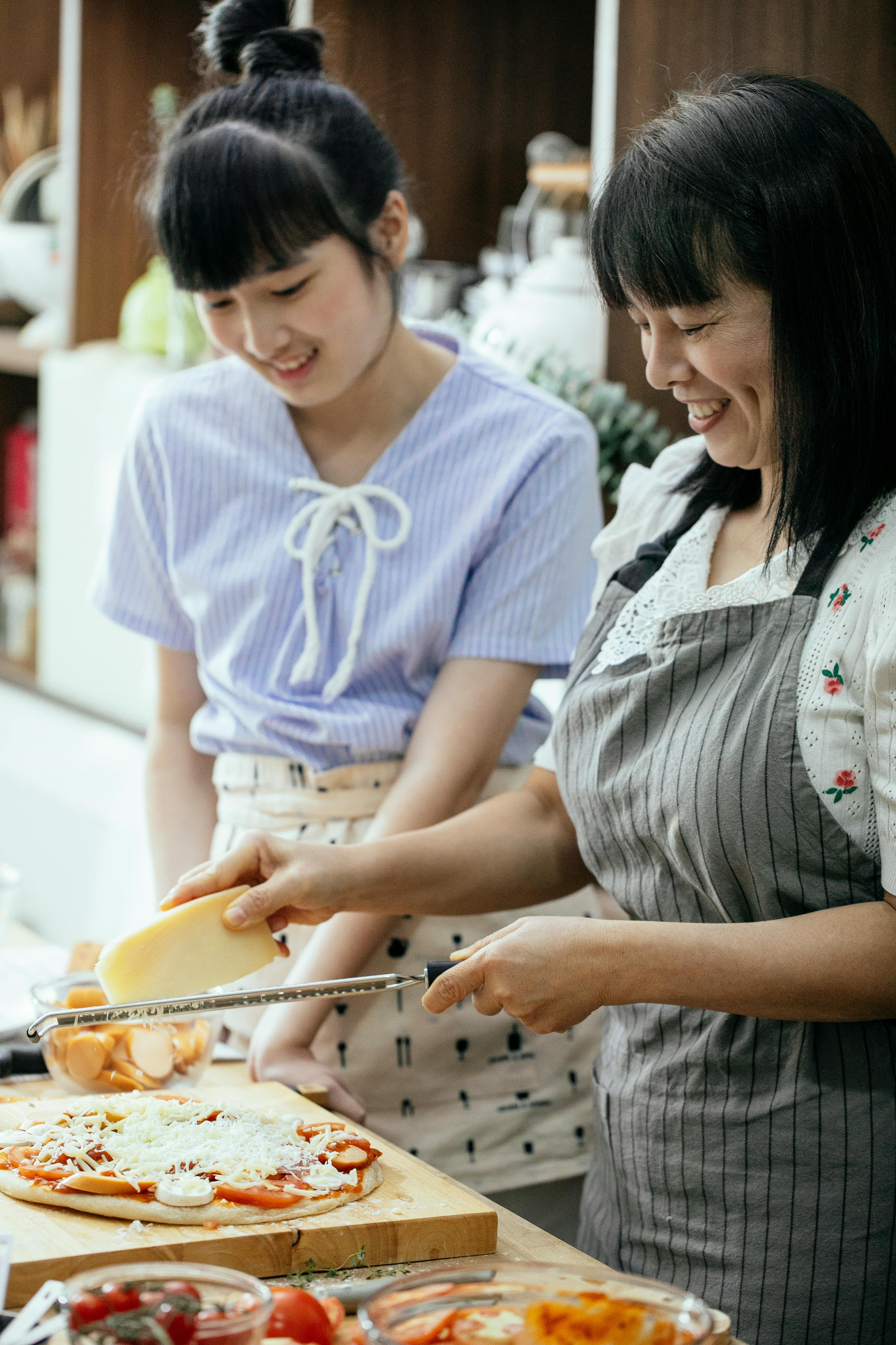 Two Women Making Homemade Pizza