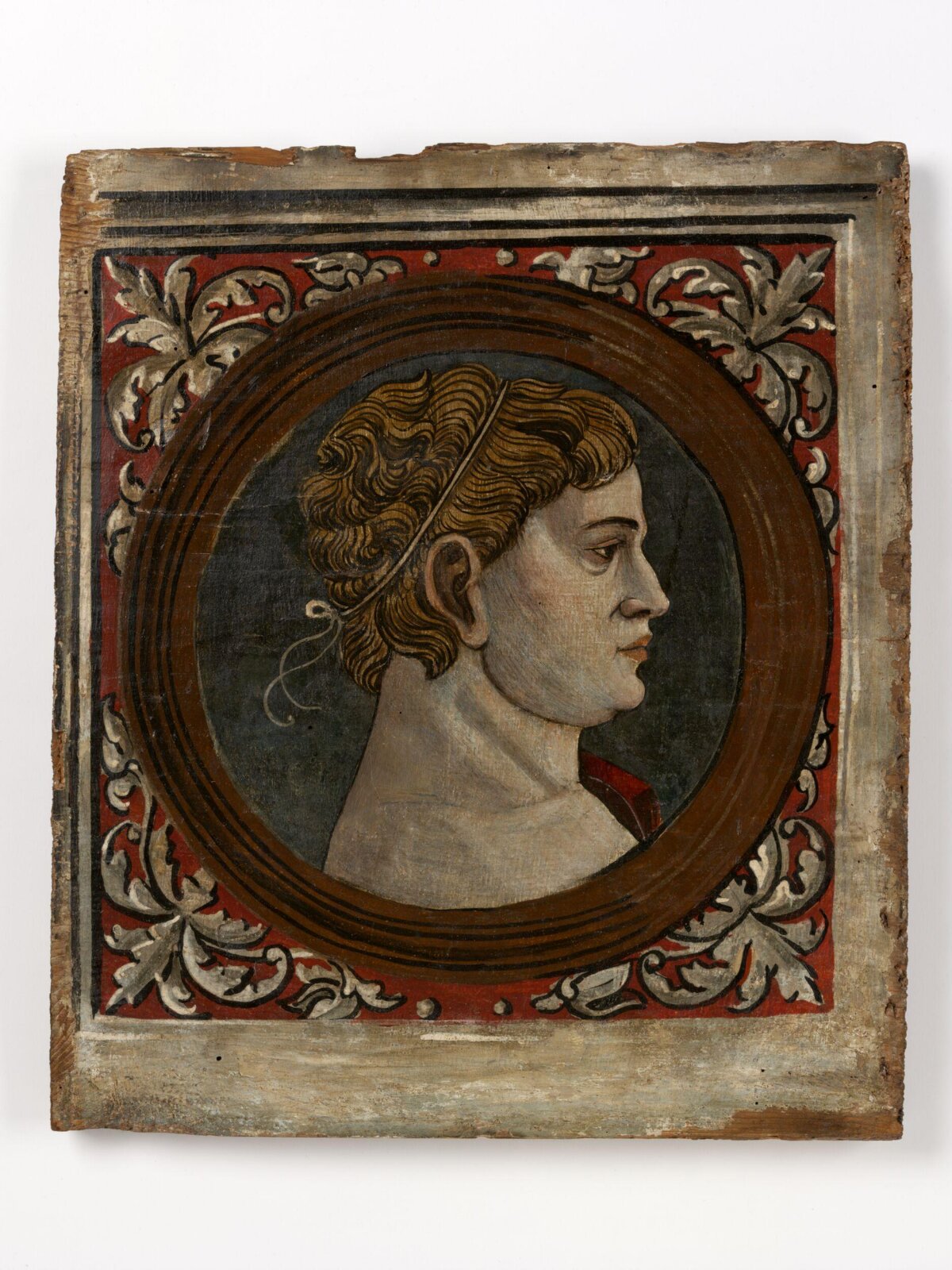 Profile Portrait of a Man on Wooden Panel