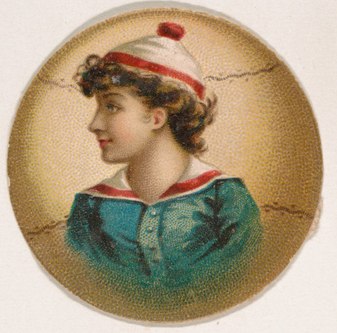 Profile Portrait of Young Woman in Cap