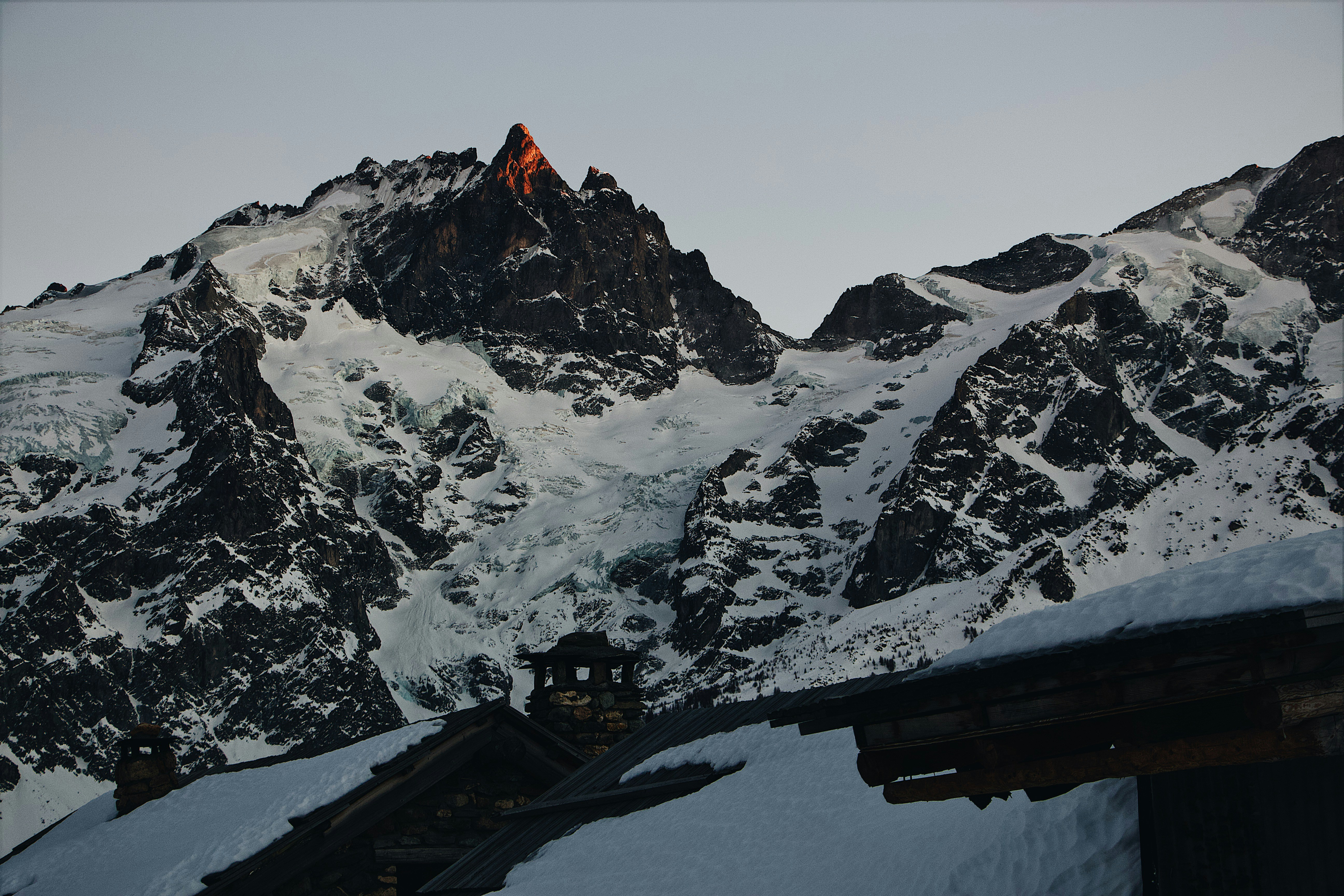 Sunlit Snow-capped Mountain Landscape
