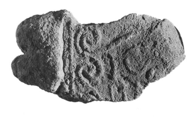 Fragment of Carved Ancient Stone Artifact