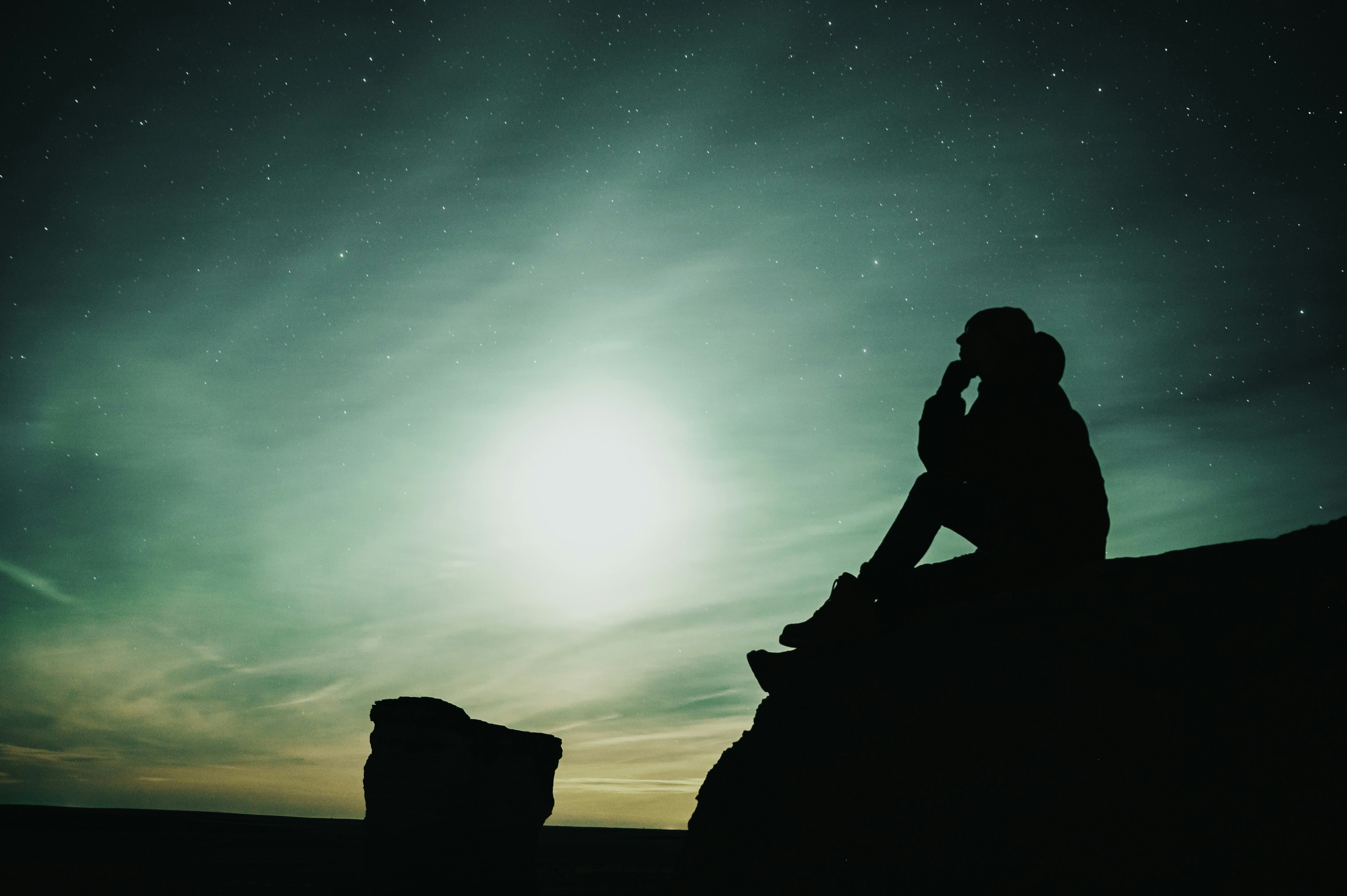 Thinking Person Silhouette in Starry Night