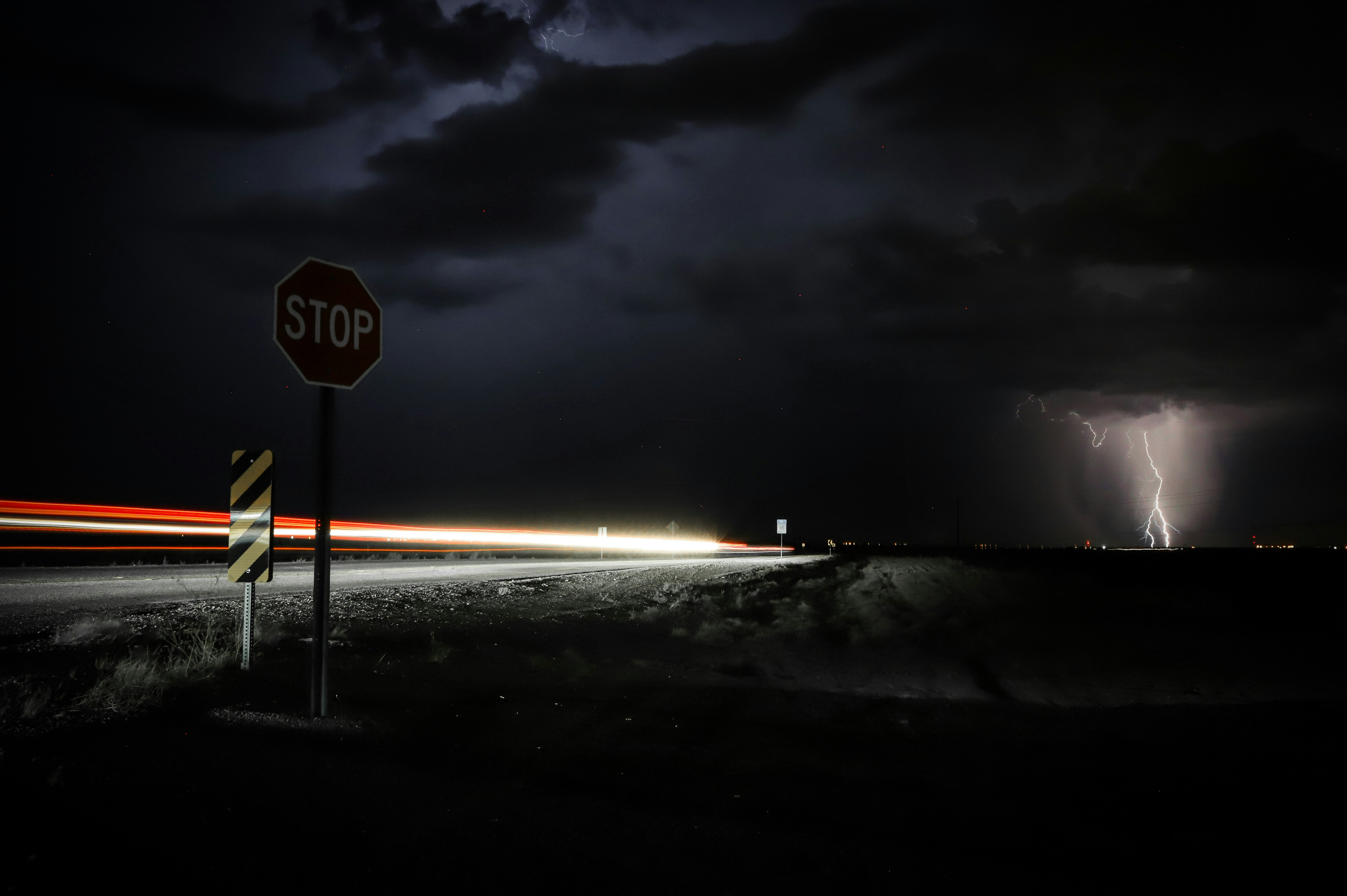 Night Storm Over Rural Highway With Lightning