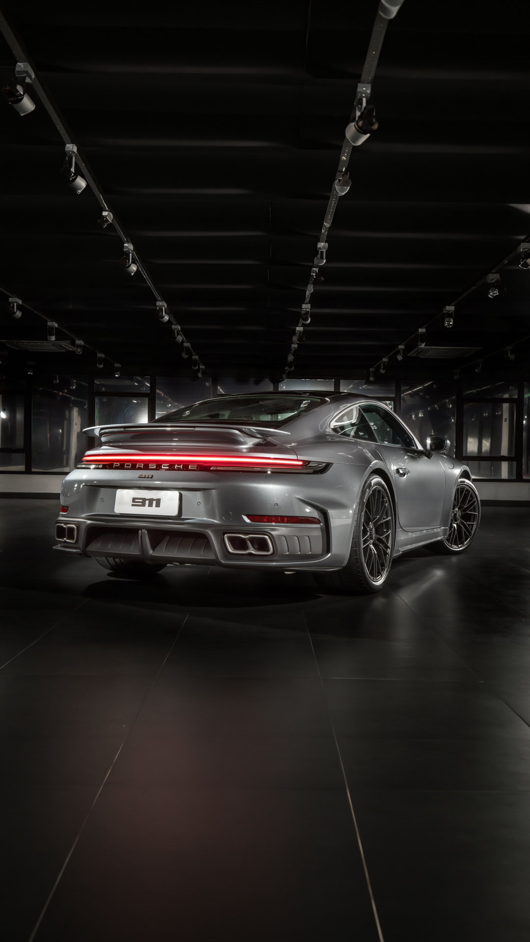 Silver Porsche 911 in Showroom