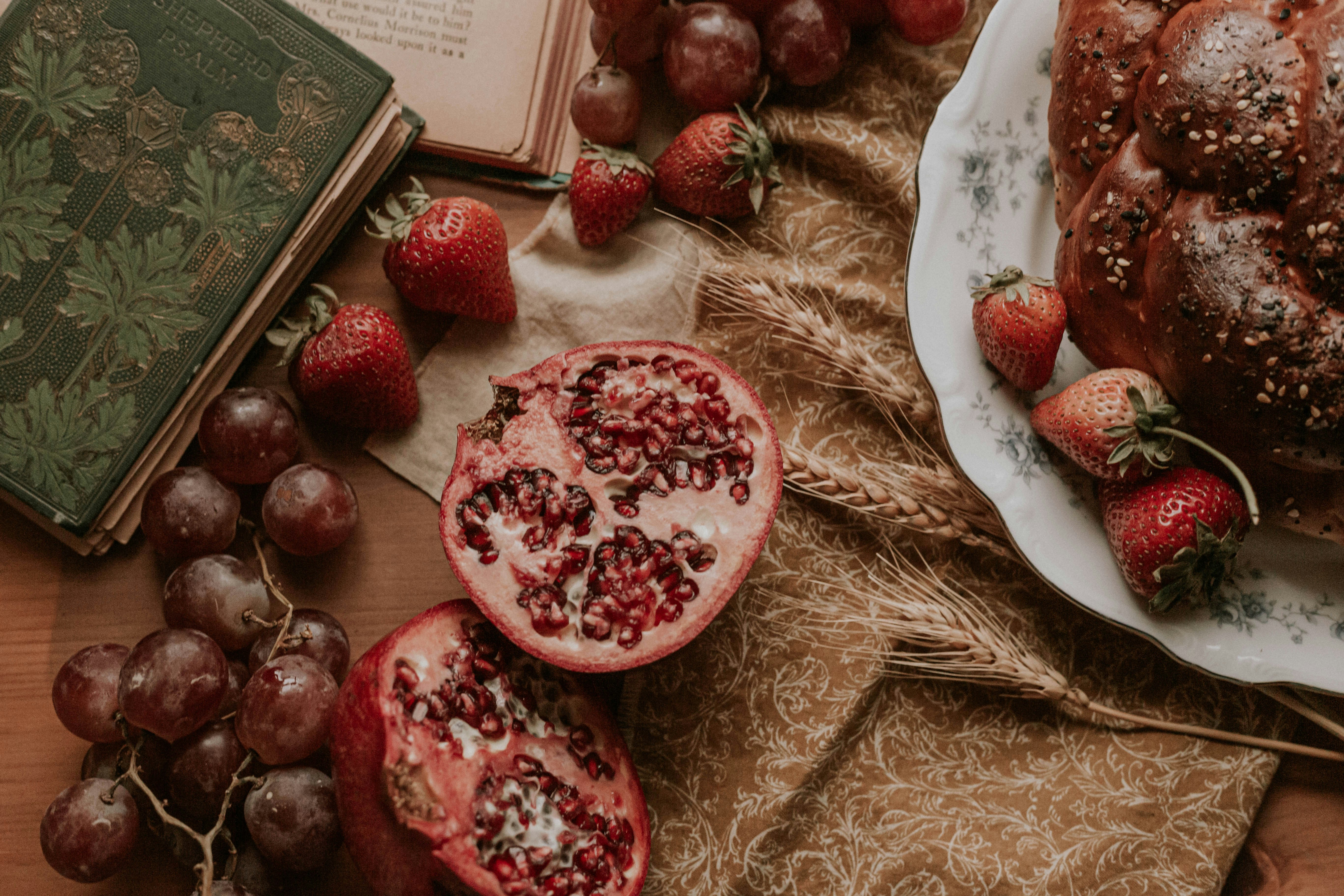 Still Life of Fruits Bread and Old Books