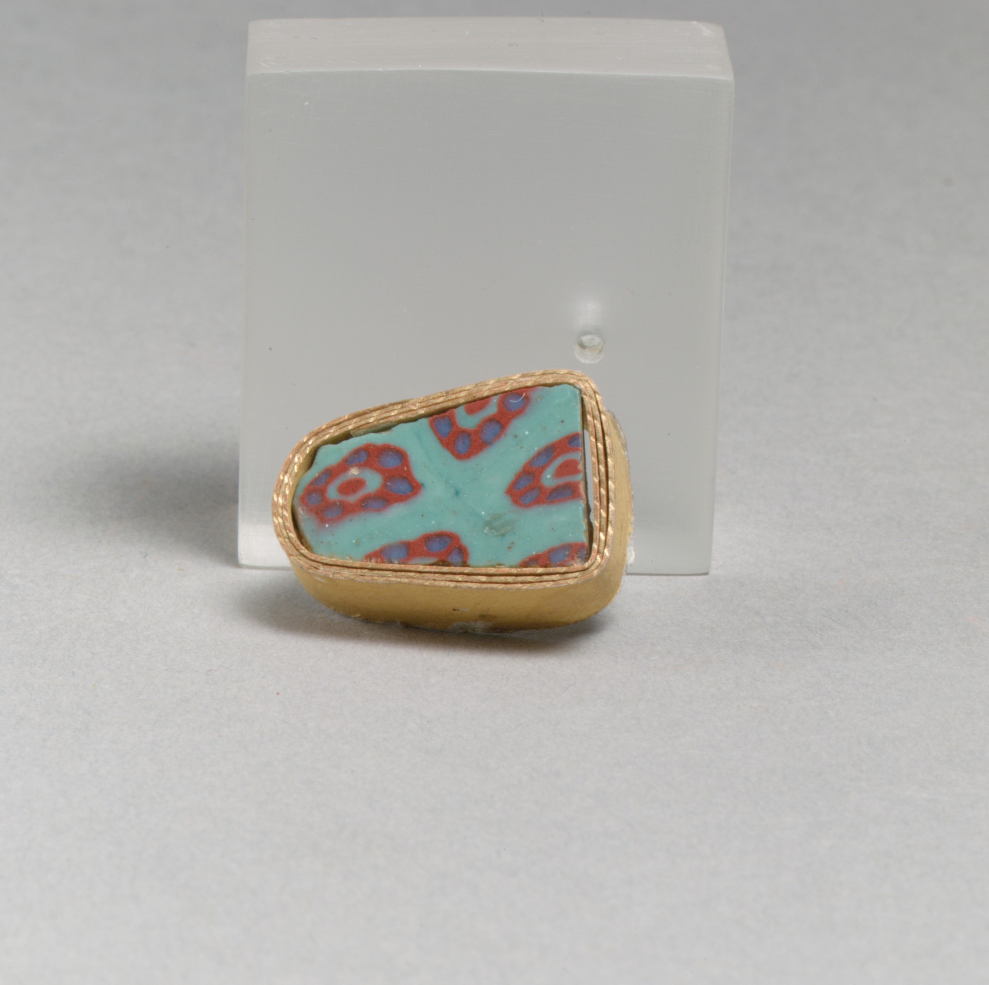 Gold-framed Patterned Glass Artifact