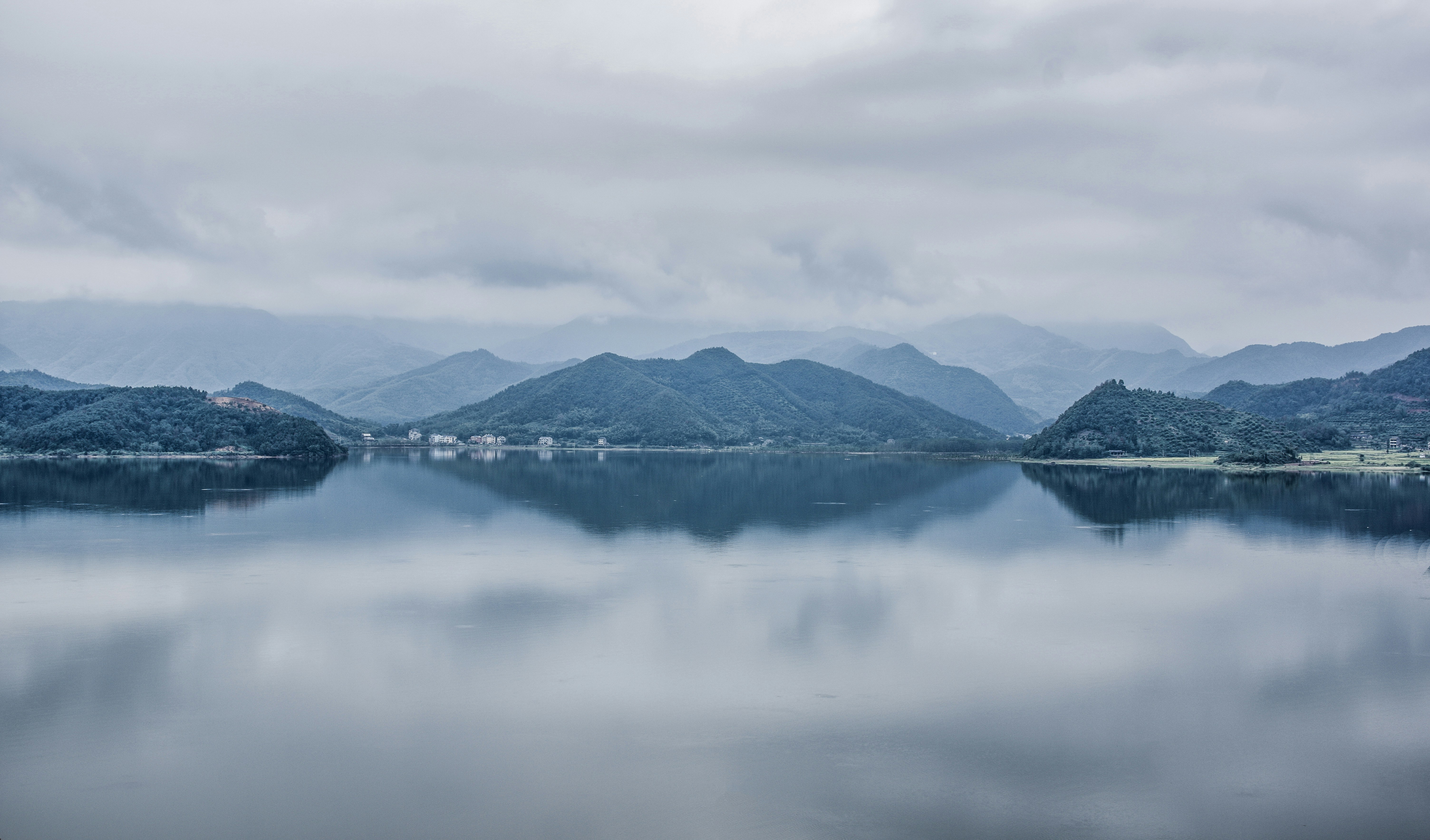 Cloudy Lake and Mountain Landscape