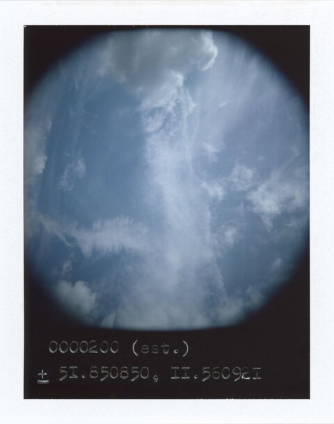 Blue Sky With Clouds and Coordinates