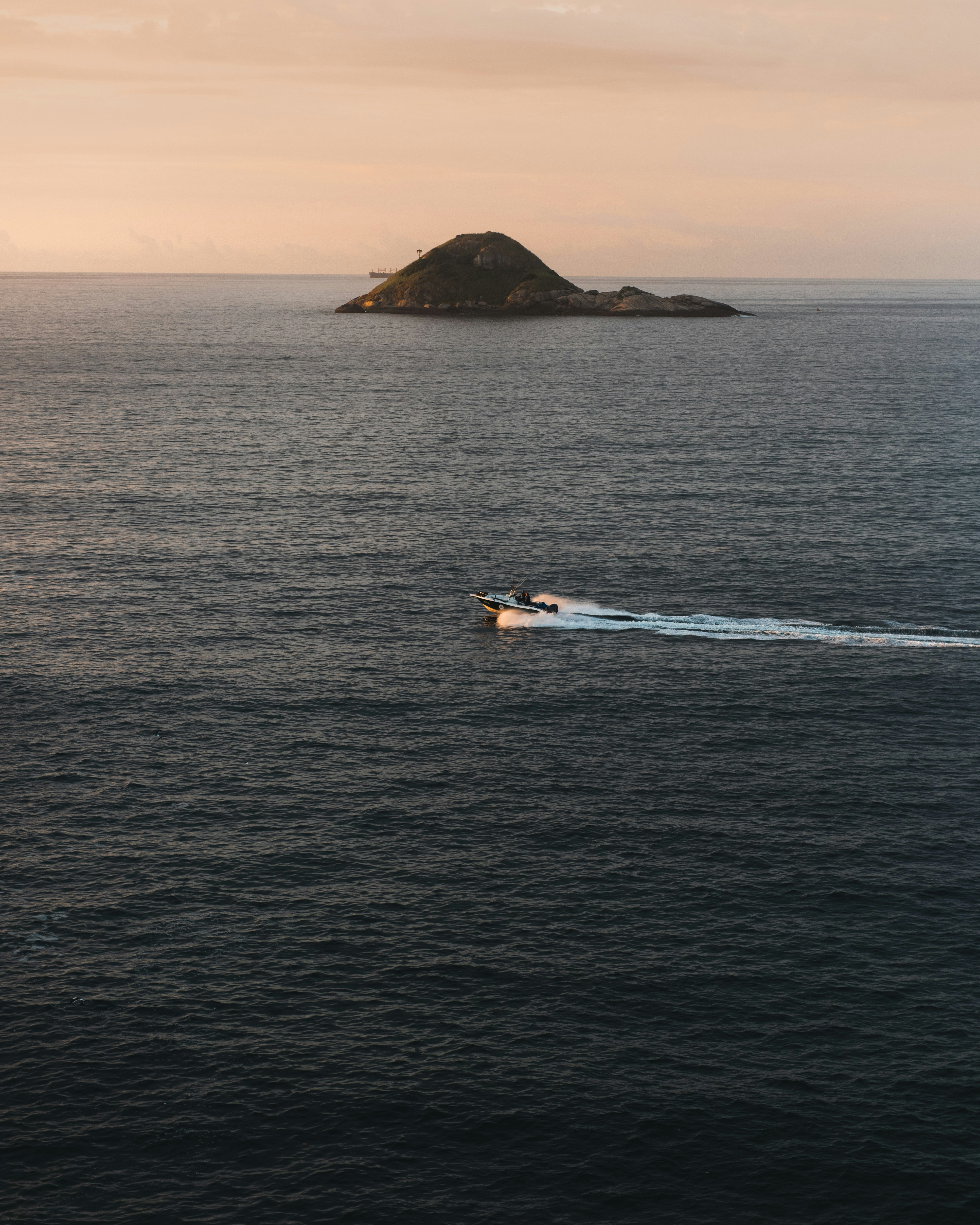 Speedboat on Open Sea at Sunset