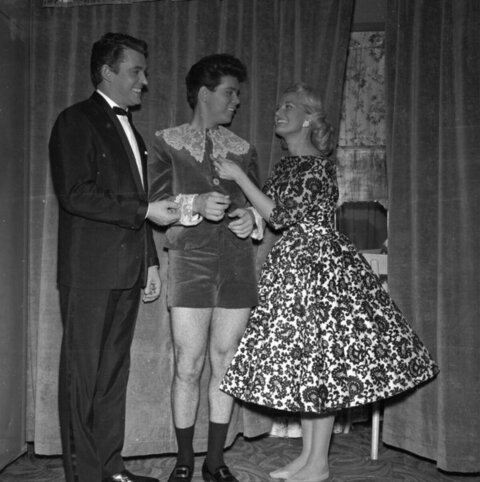 Three People Chatting in Vintage Photo