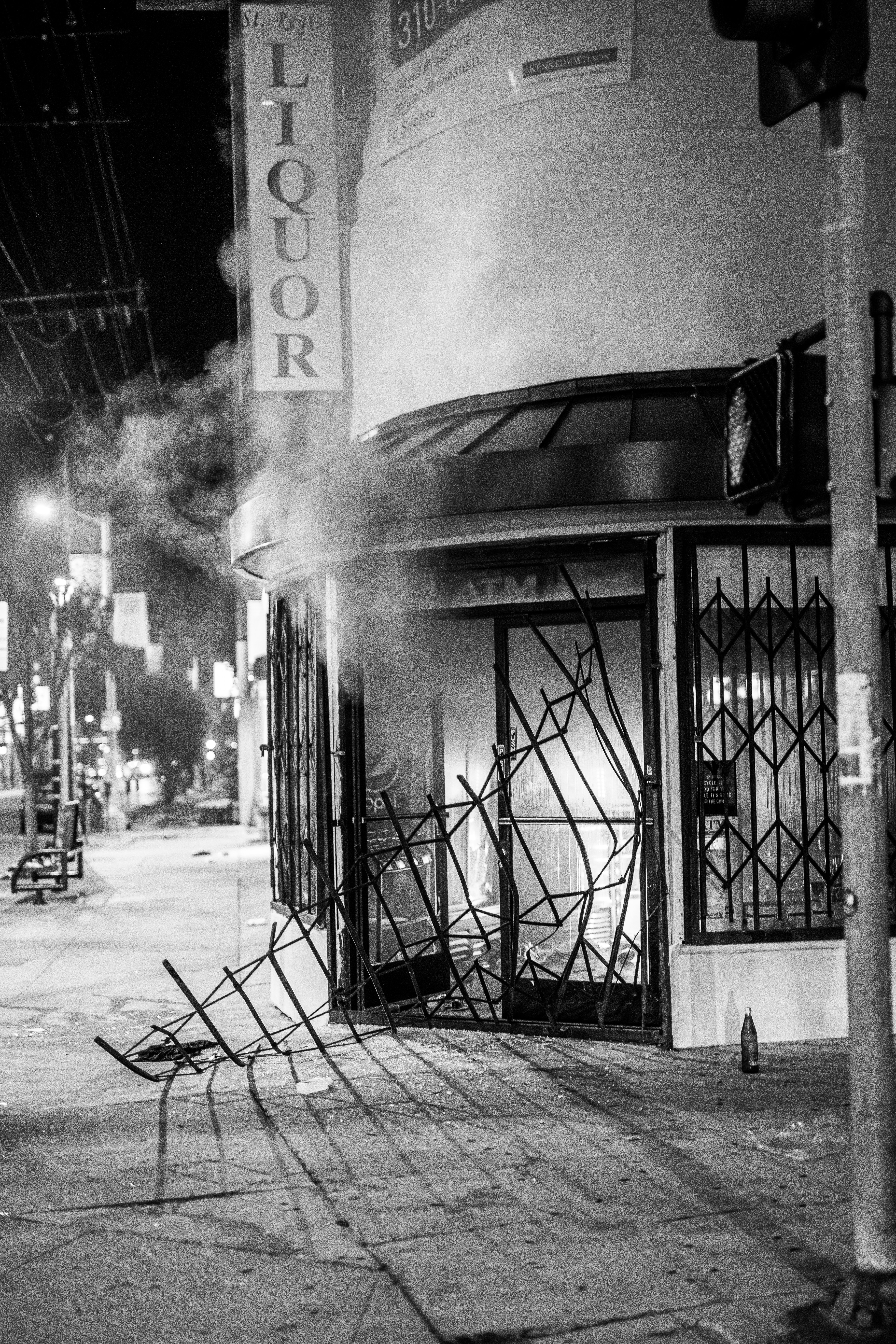 Damaged Liquor Store at Night