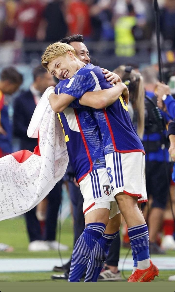 Japanese Footballers Celebratory Hug