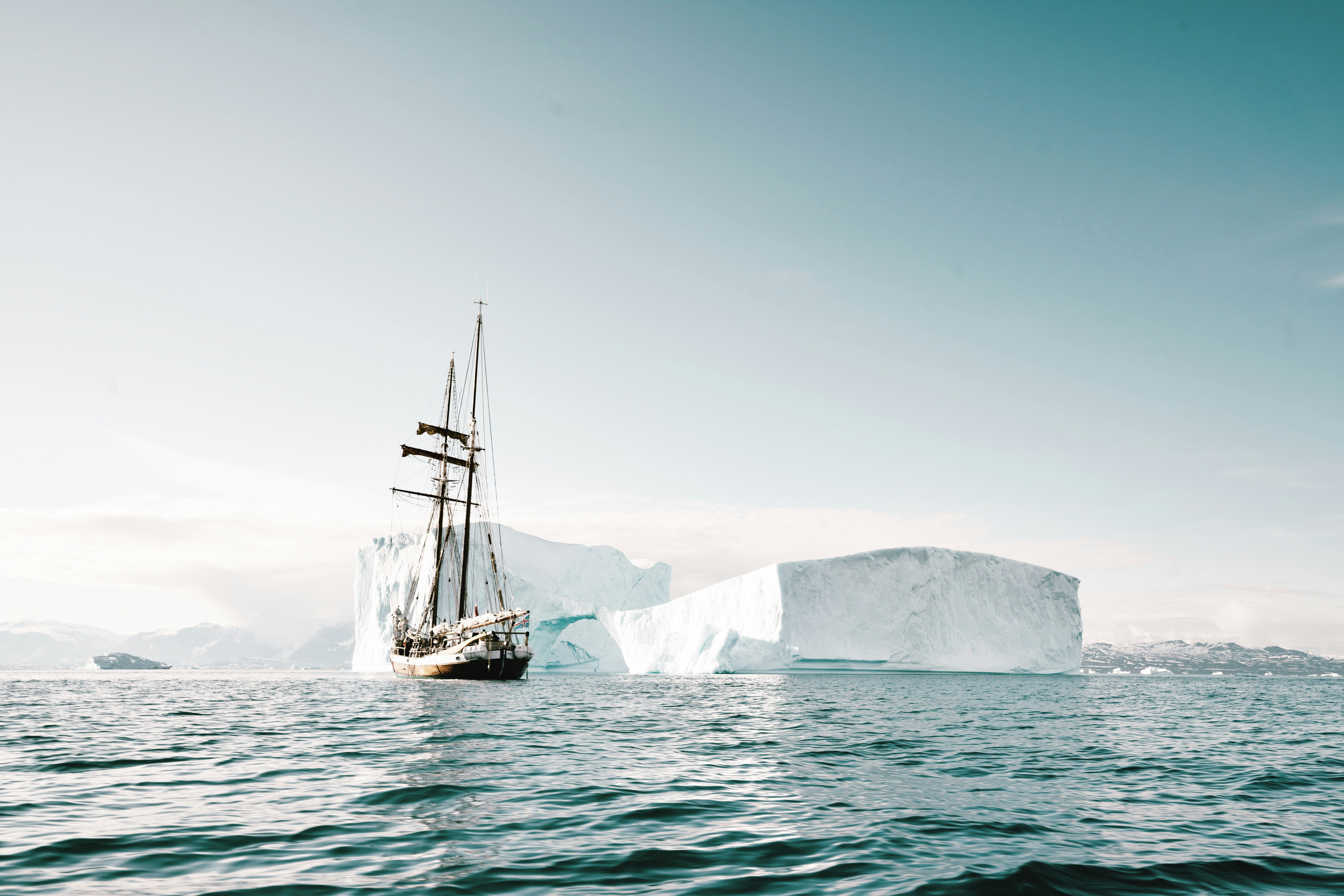 Sailing Ship Near Polar Icebergs