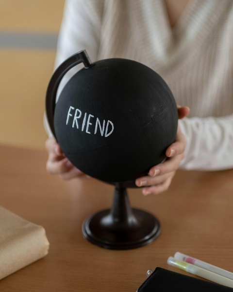 Black Chalk Globe With Word Friend