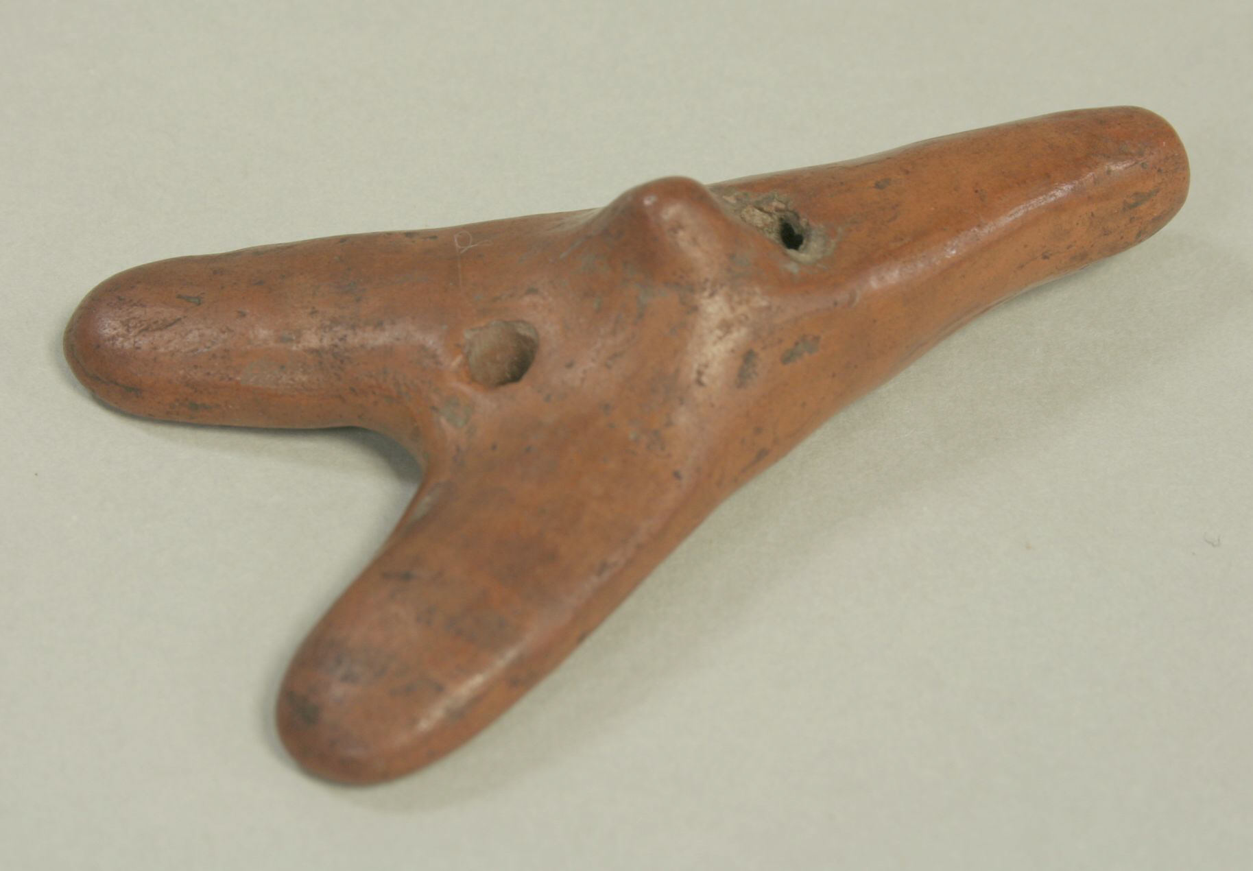 Ancient Triangular Perforated Clay Artifact