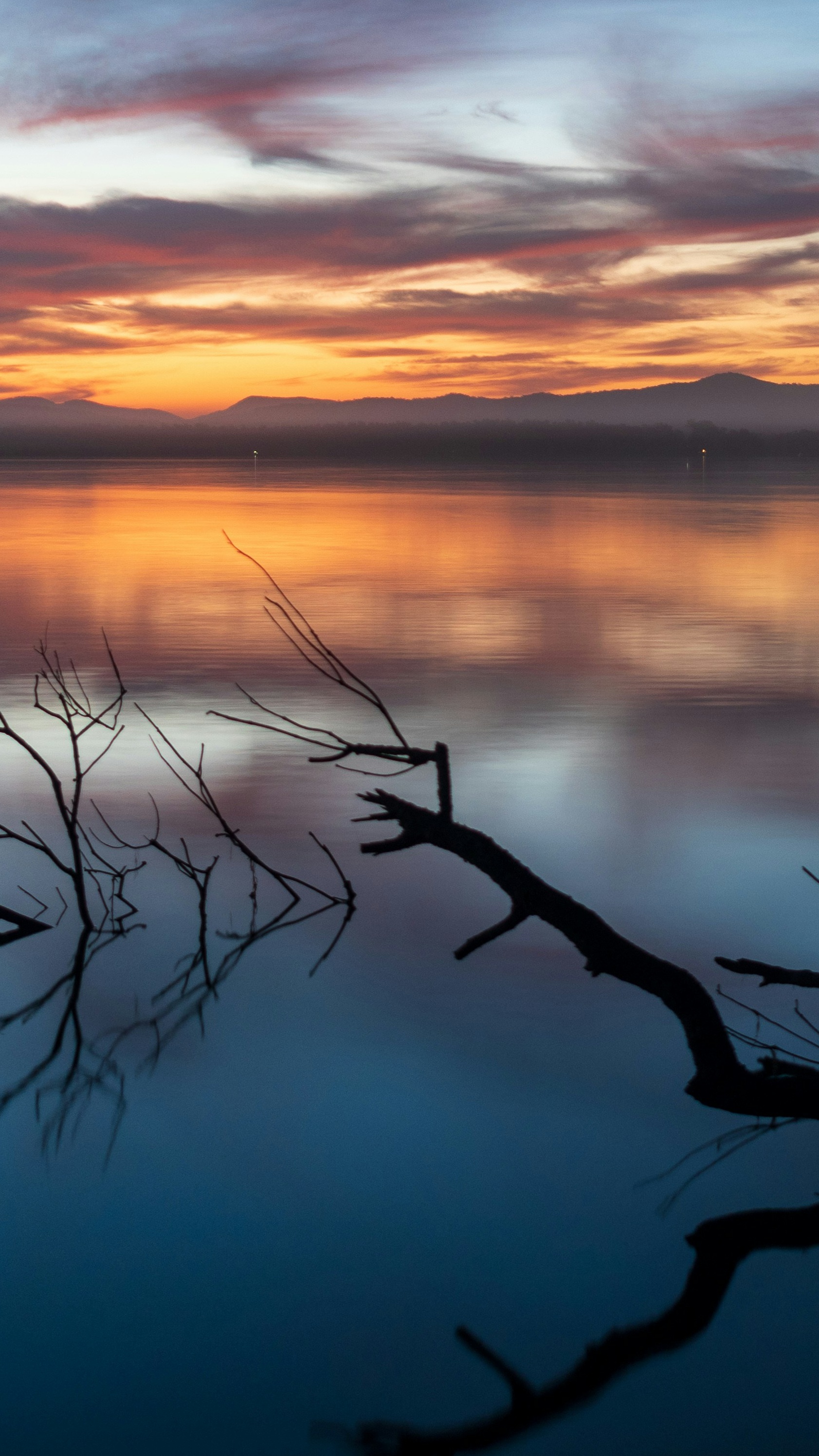 Sunset Over Calm Lake