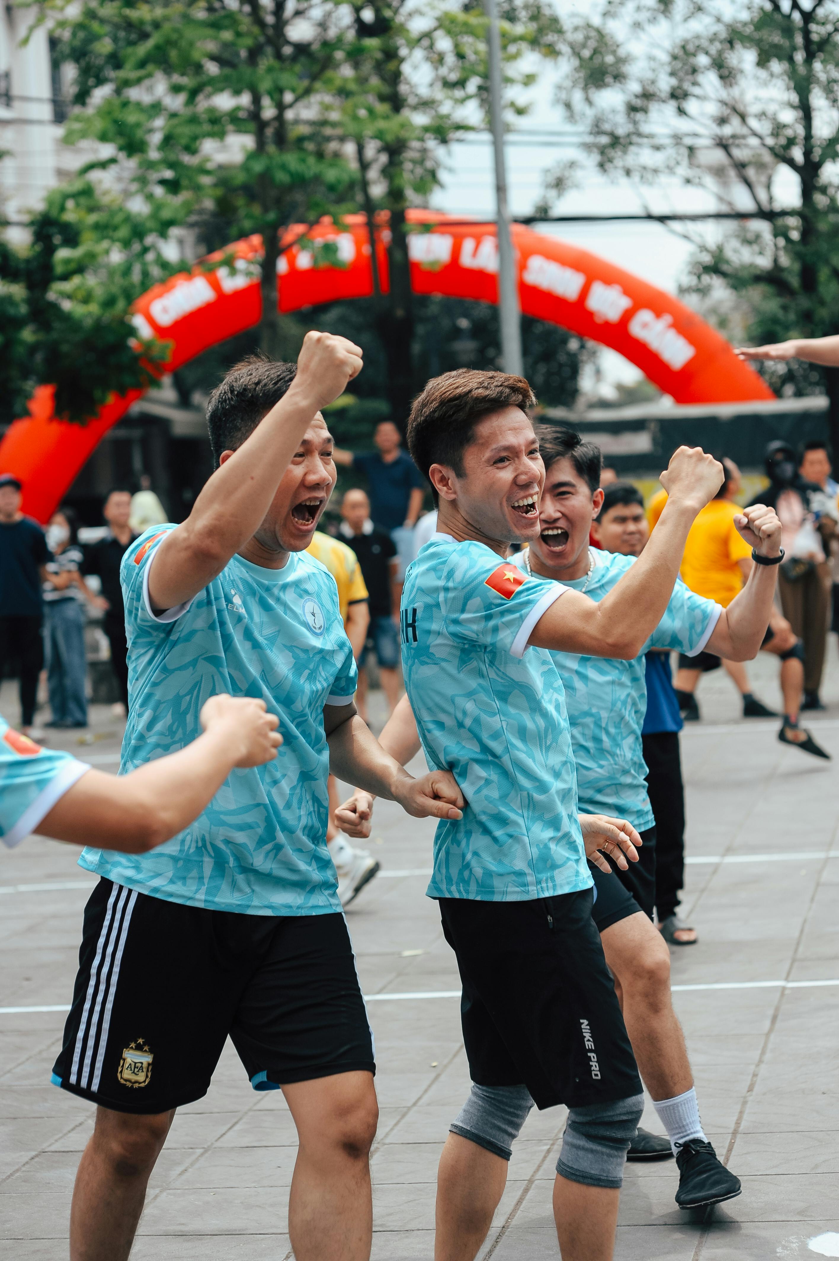 Team Athletes Celebrating Victory
