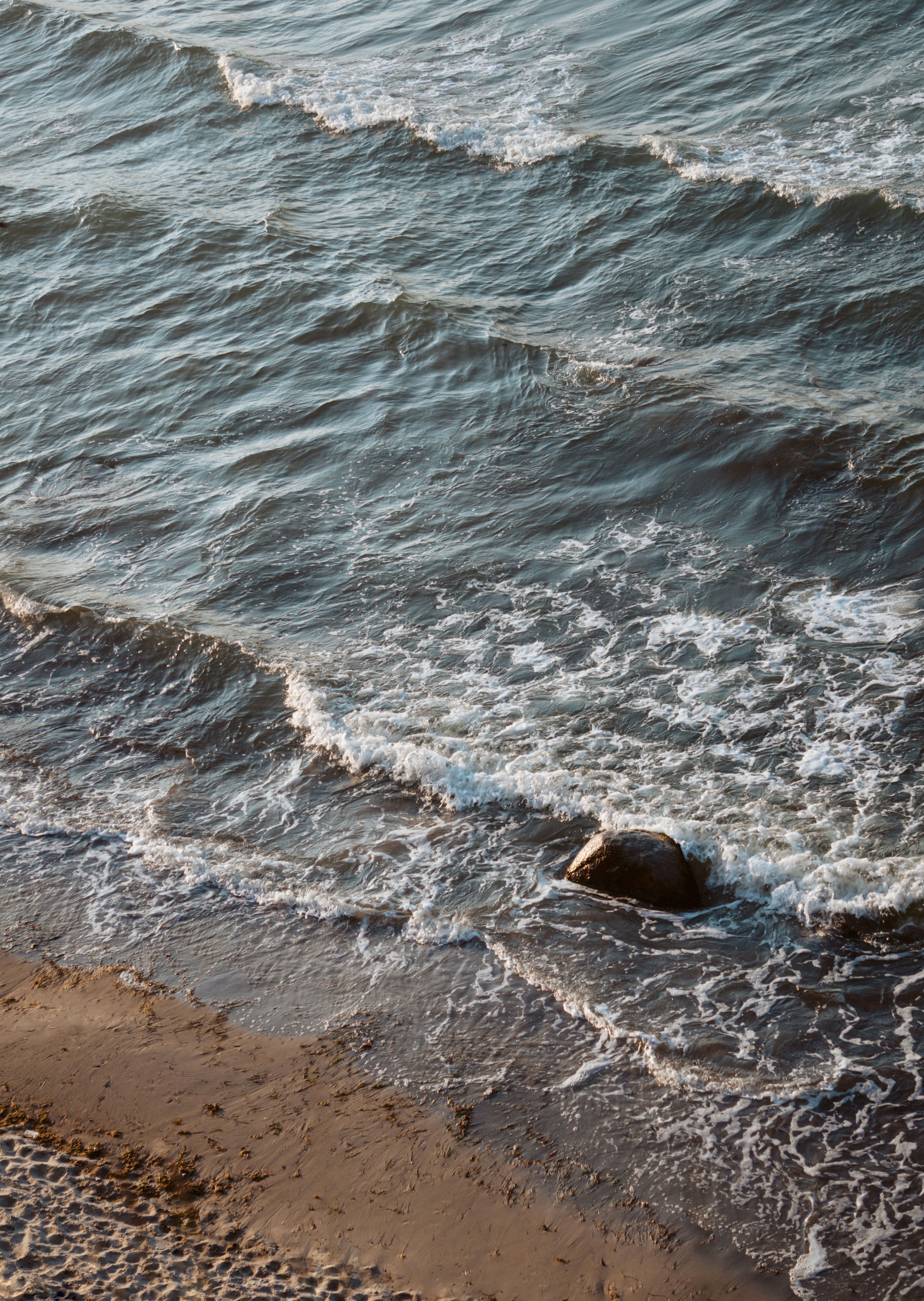 Waves Rolling on Sandy Beach