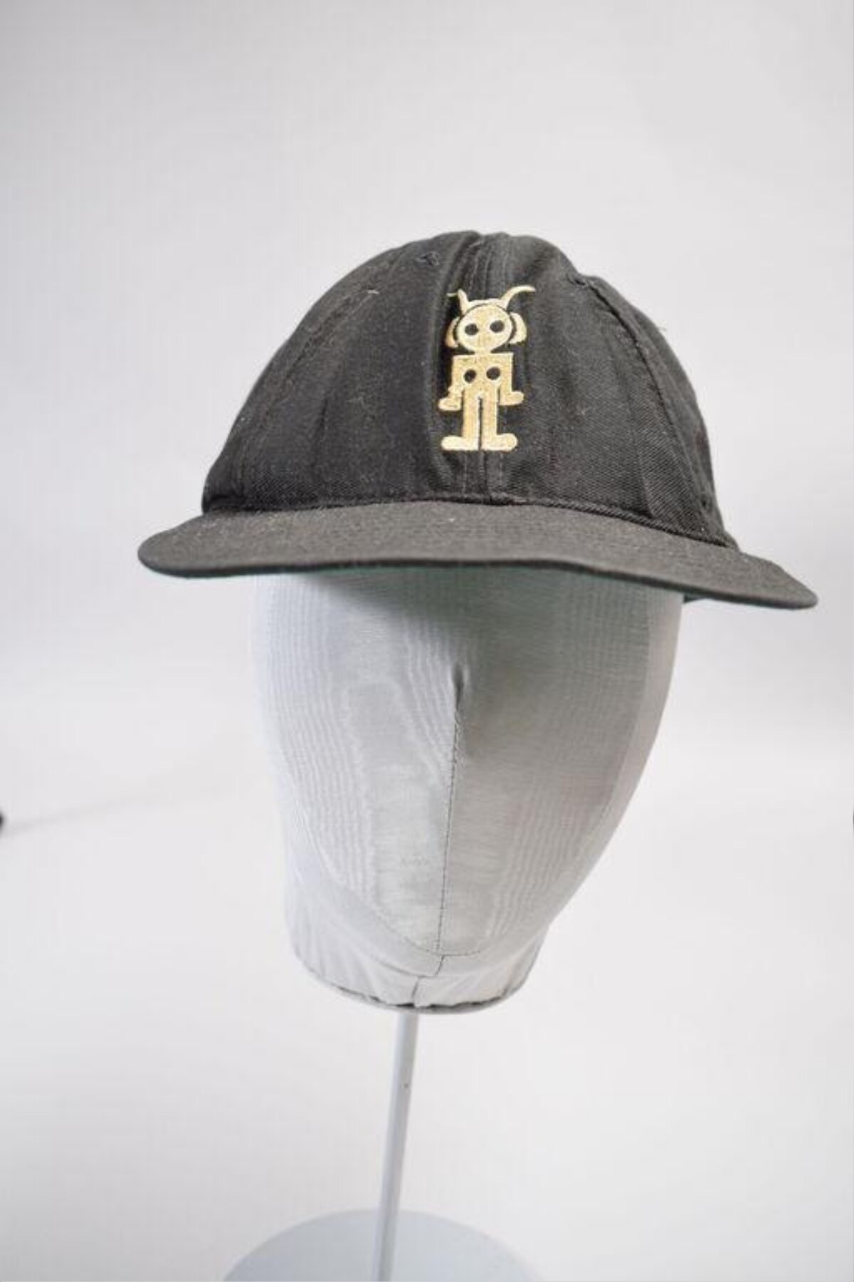Black Cap With Gold Robot Logo