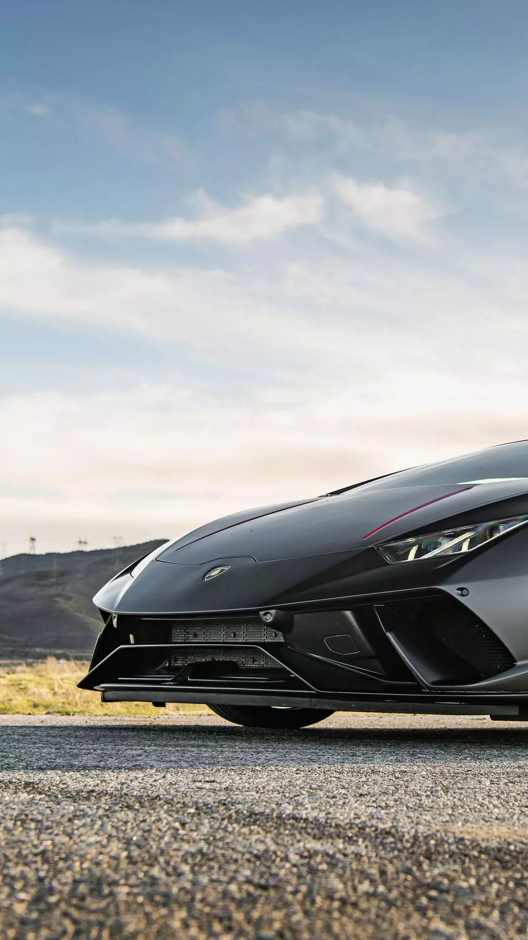 Black Lamborghini on Open Road