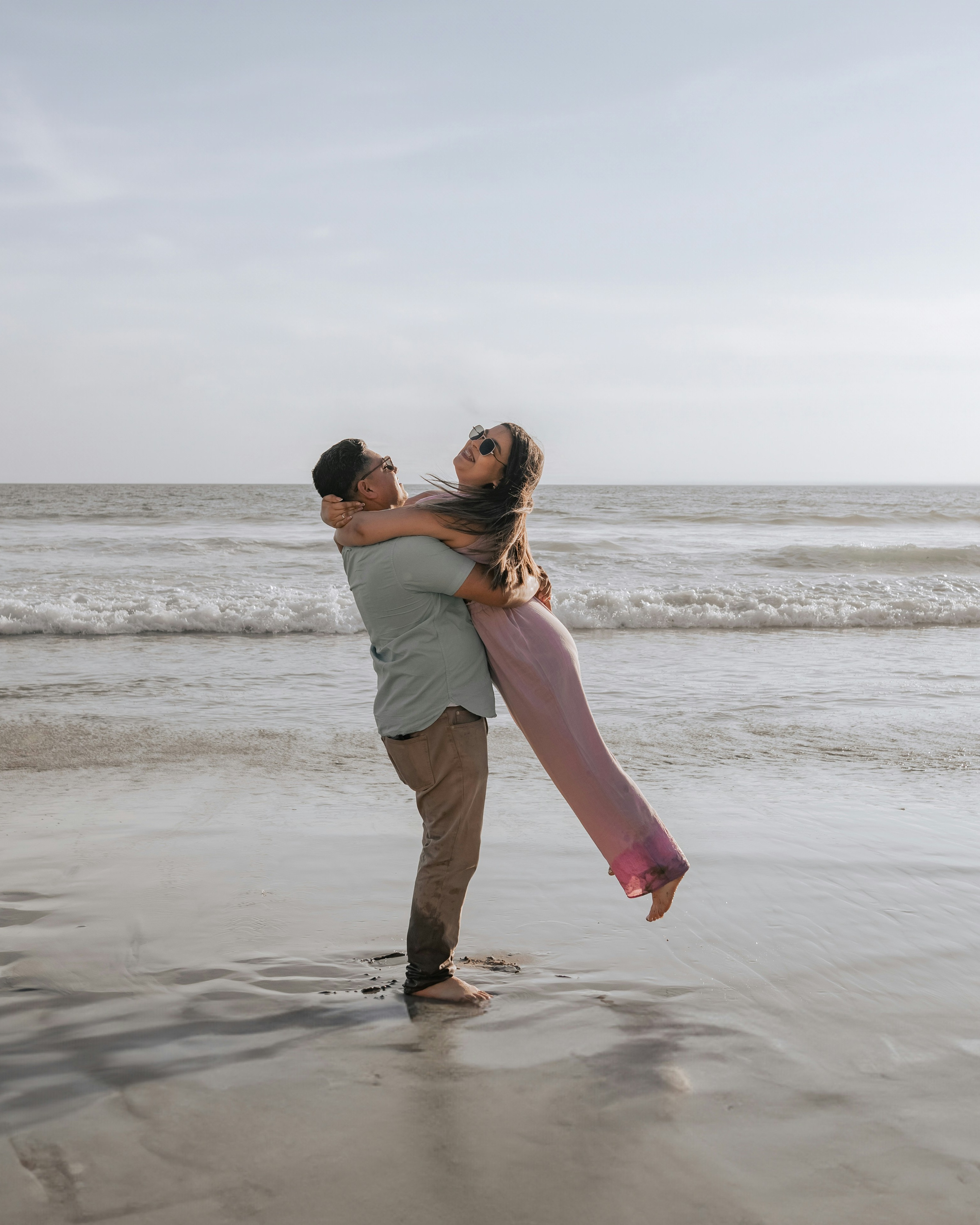 Couple Embracing on Beach