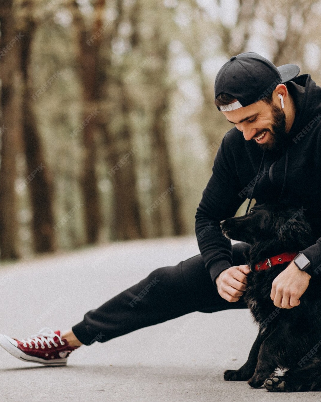 Happy Man With His Dog In Forest