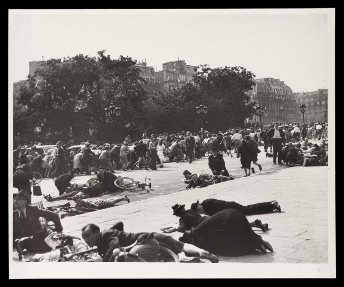 Crowd Taking Cover in City Square