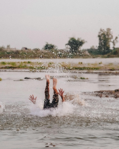 Person Falling Into Shallow River