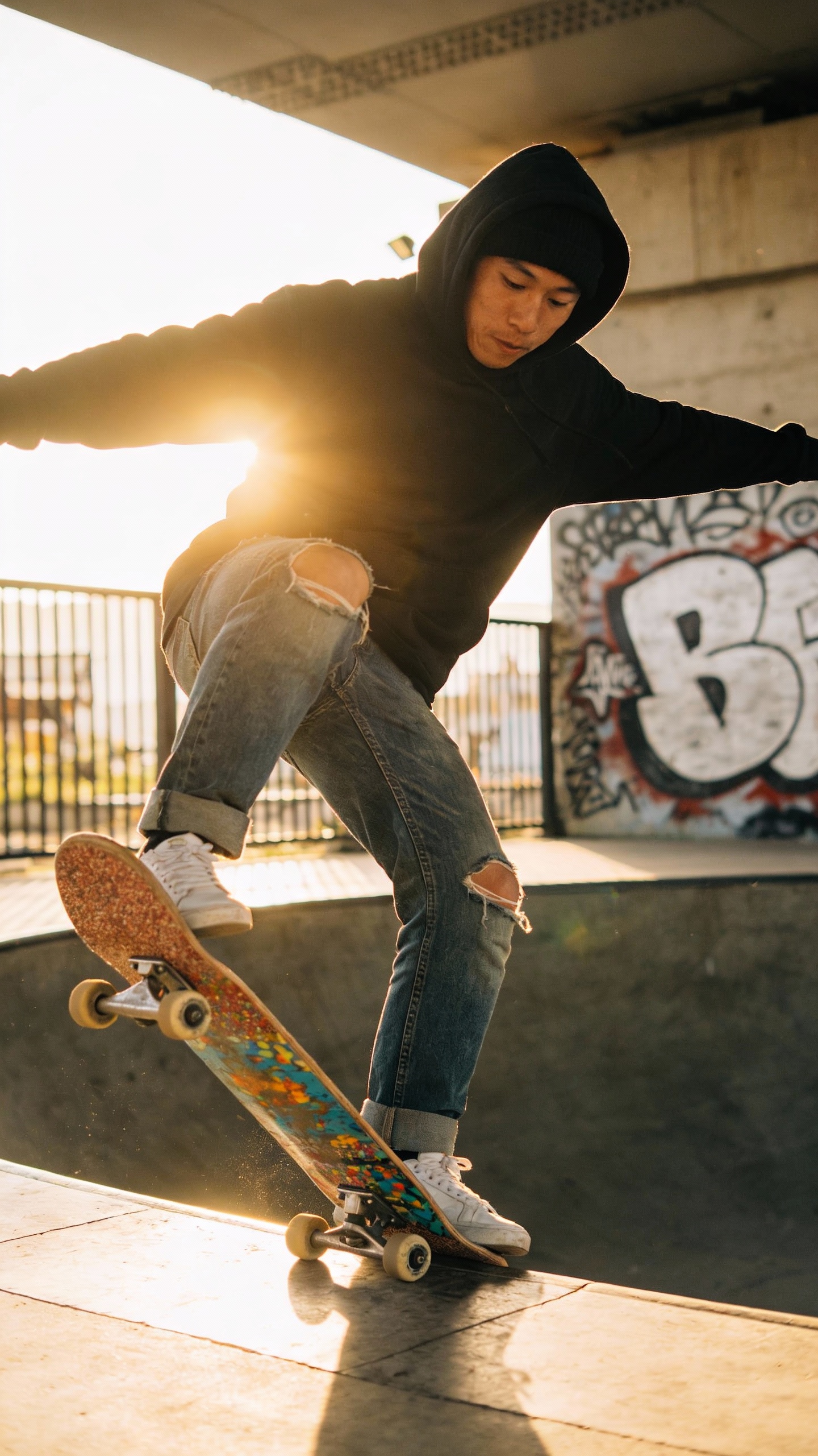 Skateboarder Doing Trick at Skatepark