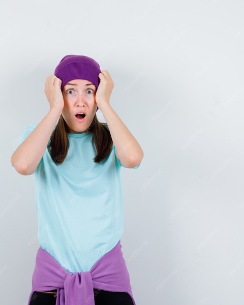 Shocked Woman Holding Her Head