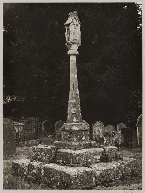 Ancient Stone Cross in Graveyard