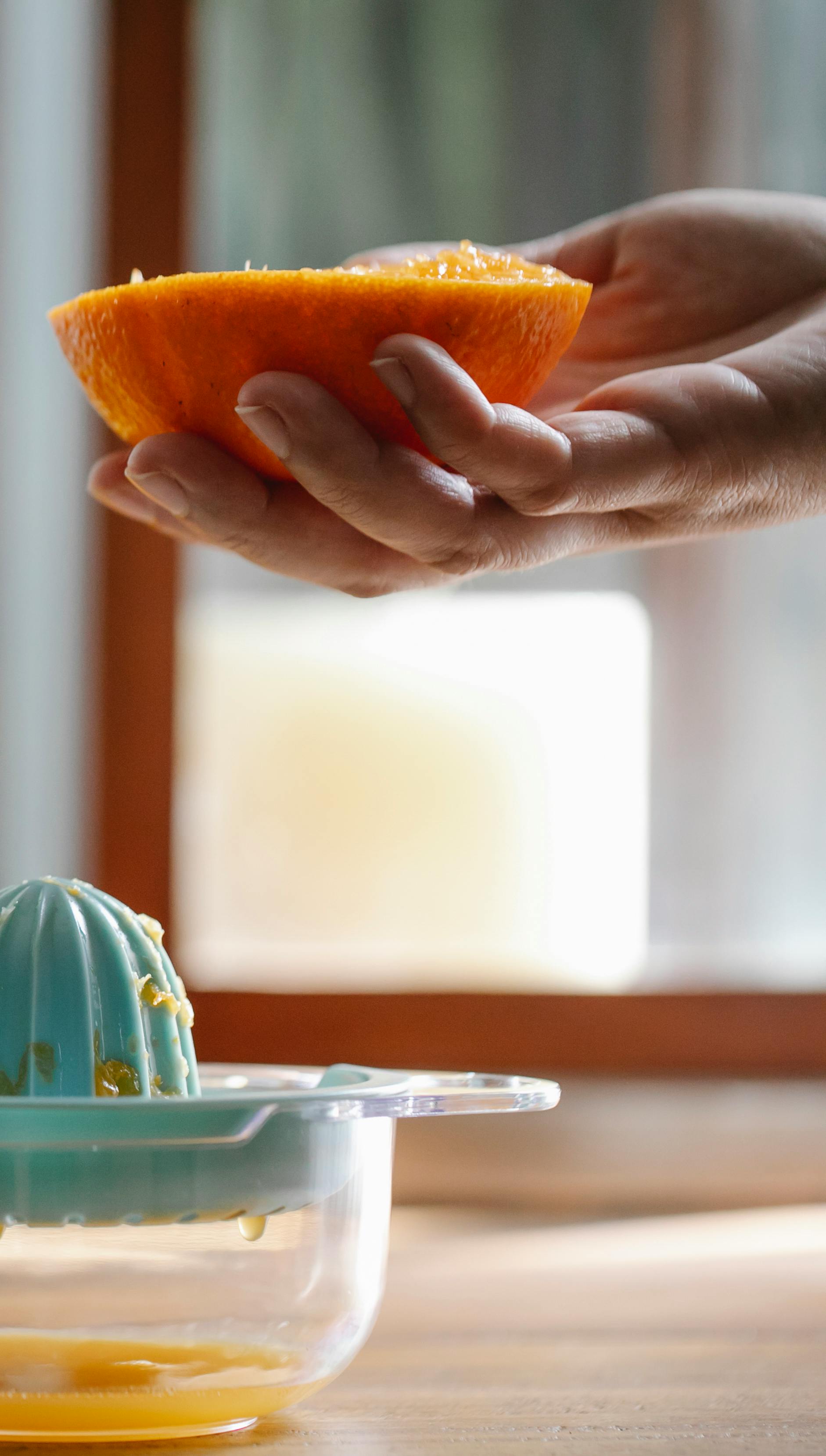 Squeezing Fresh Orange for Juice