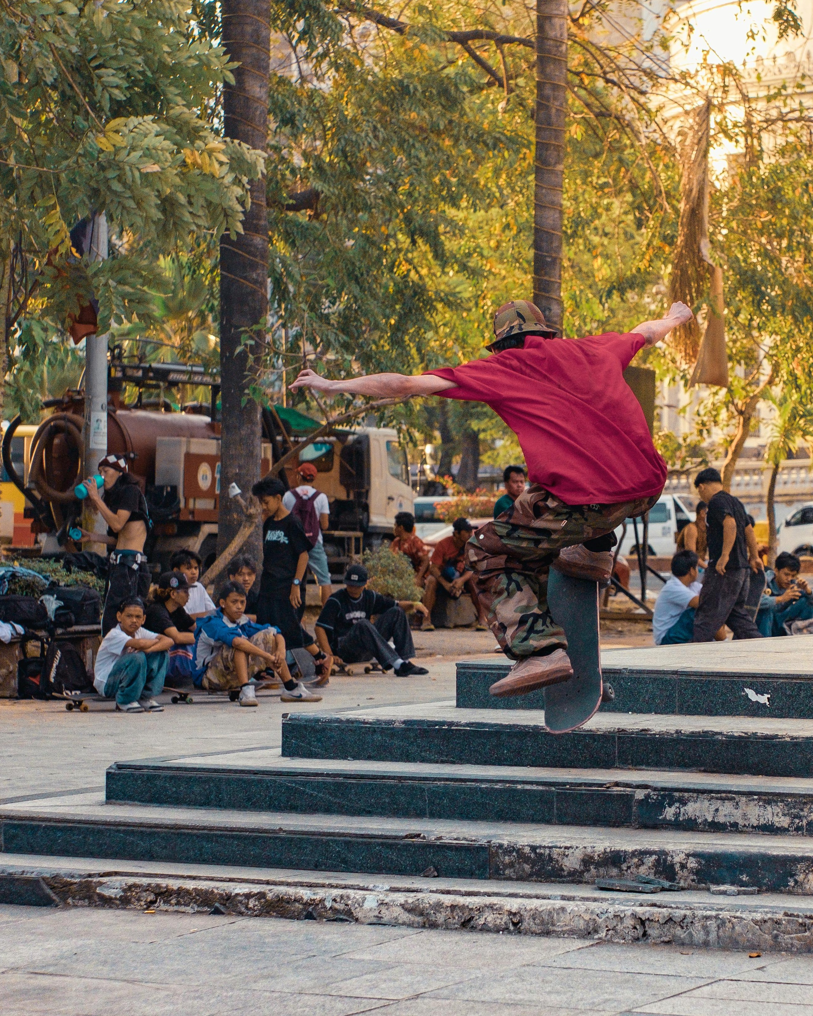 Skateboarder Mid Trick Over Park Steps