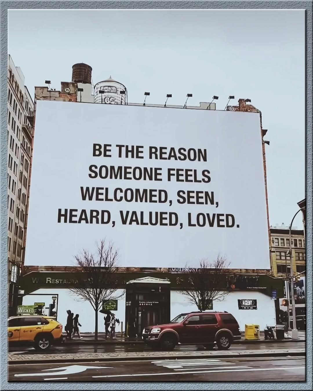 Inspirational Message Billboard on City Street