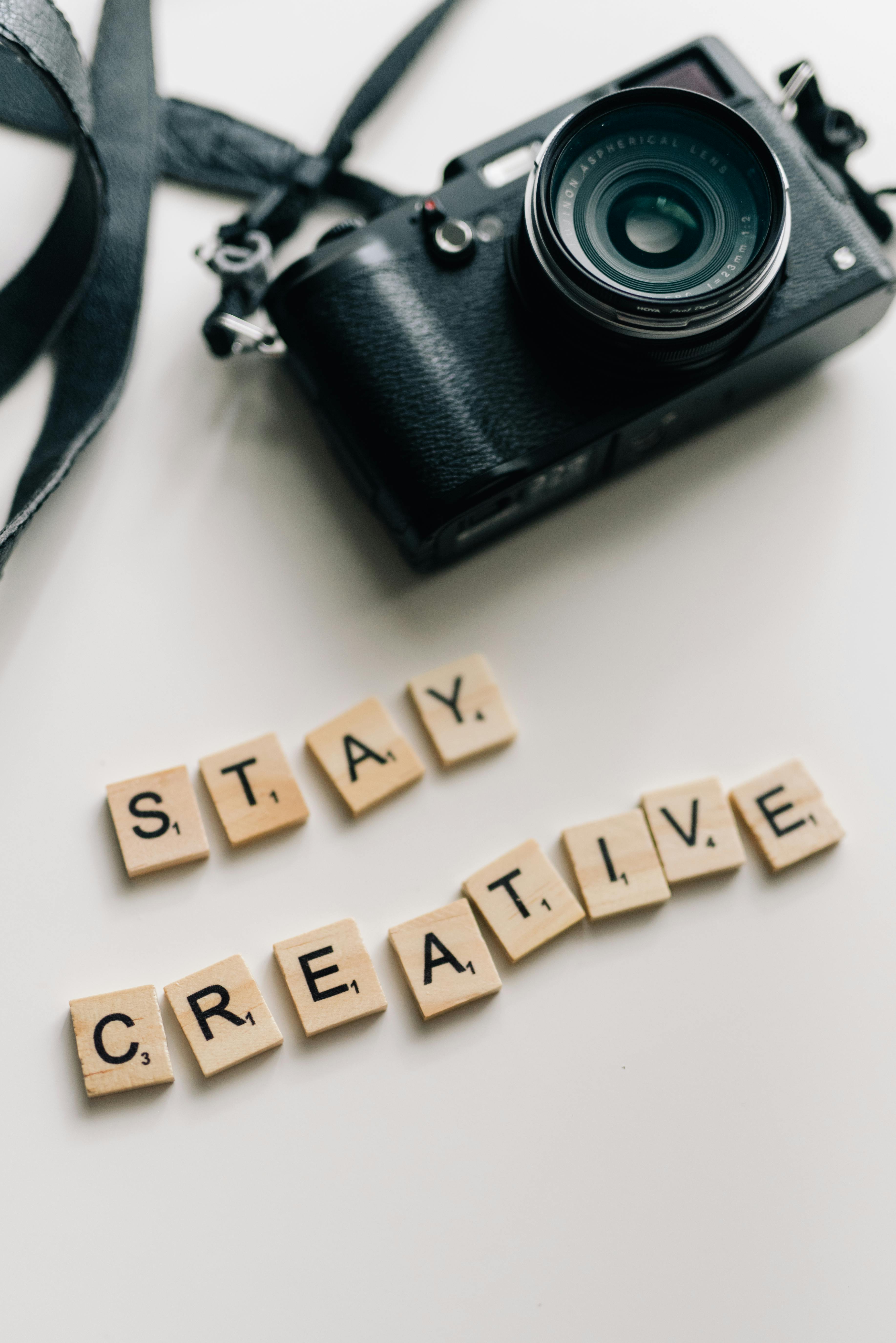 Stay Creative Message With Black Camera