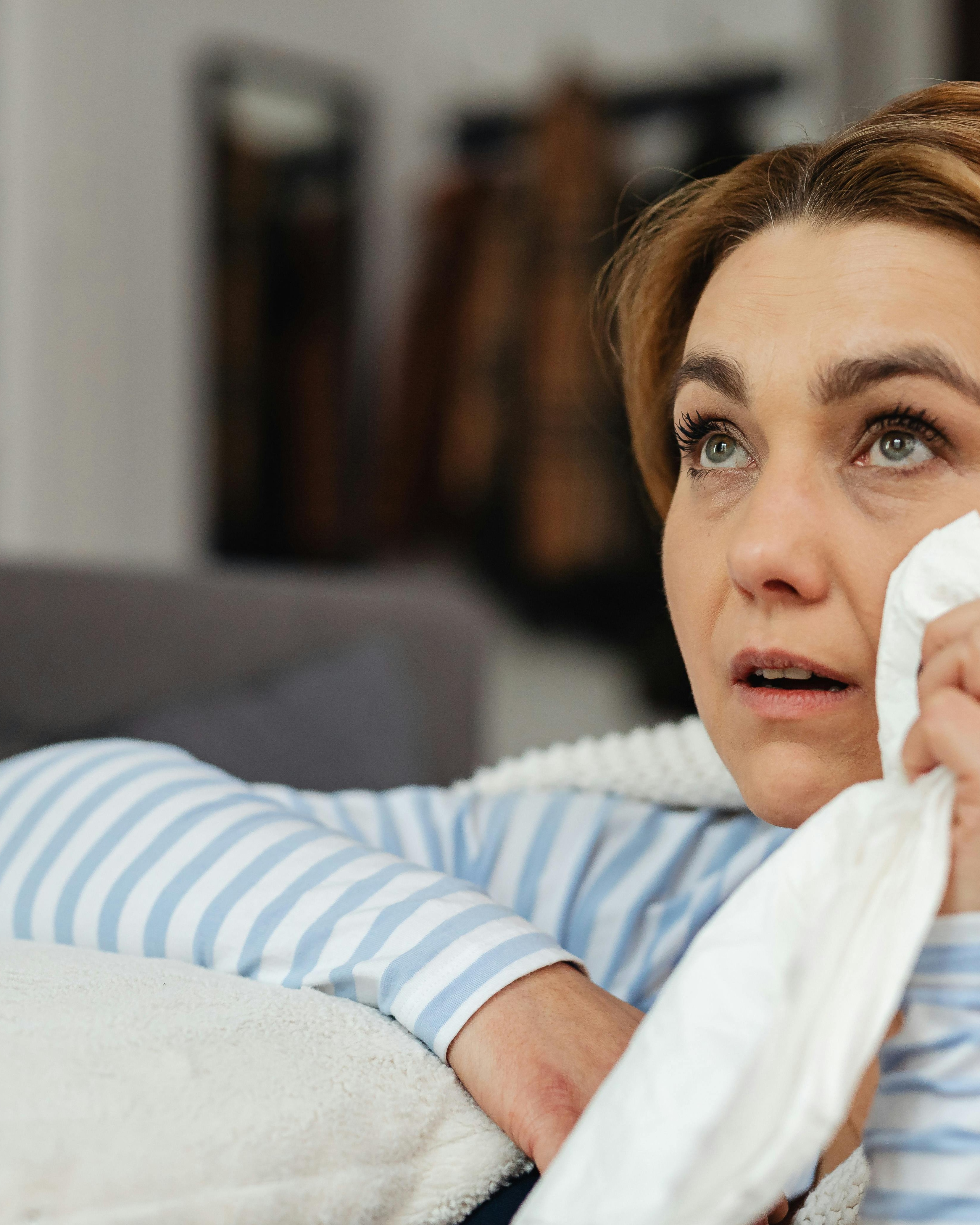 Upset Crying Woman Holding Tissue