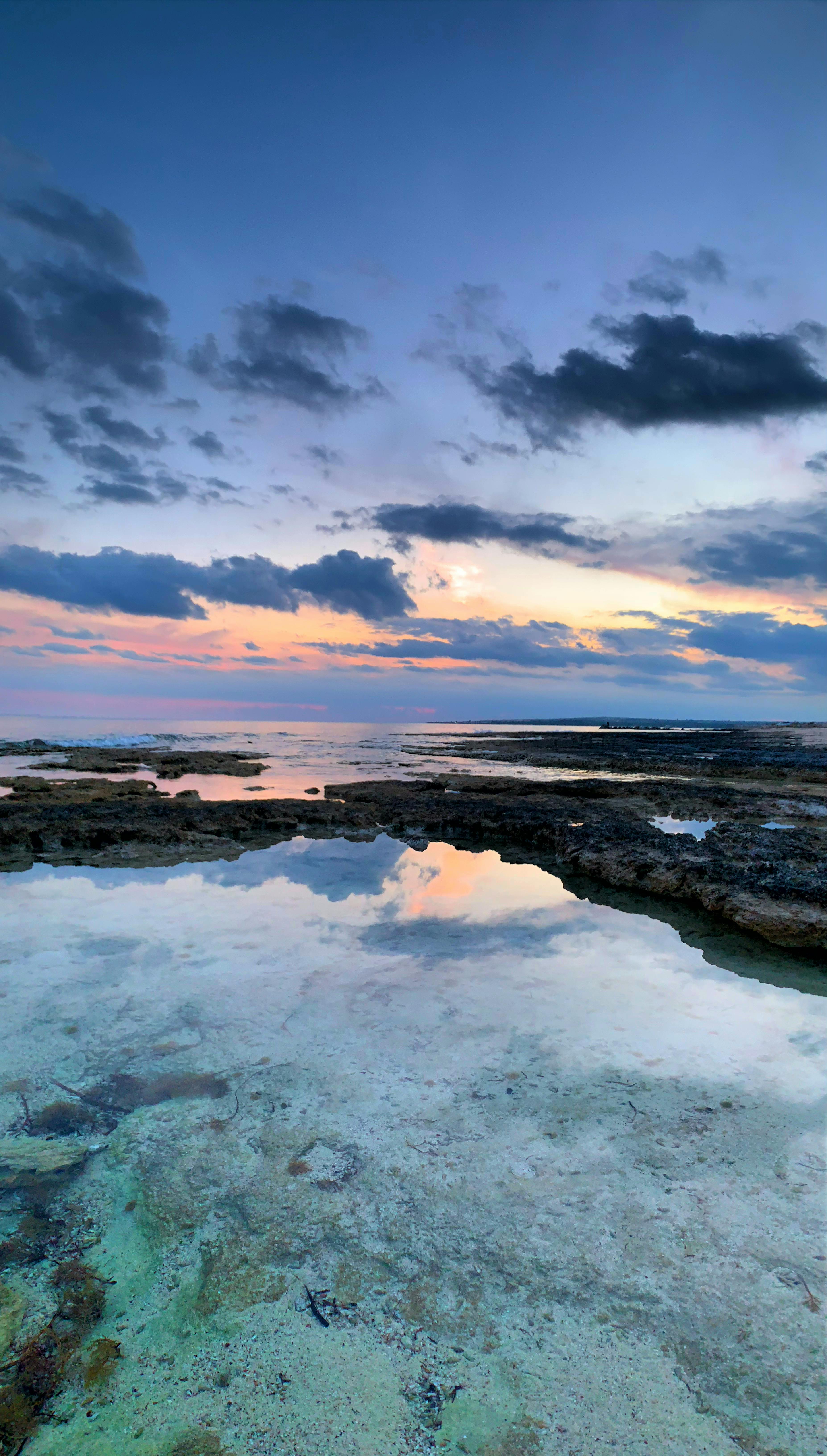 Tide Pool Reflection at Coastal Sunset