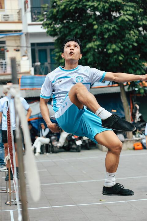 Sepak Takraw Player Mid-Air Kick