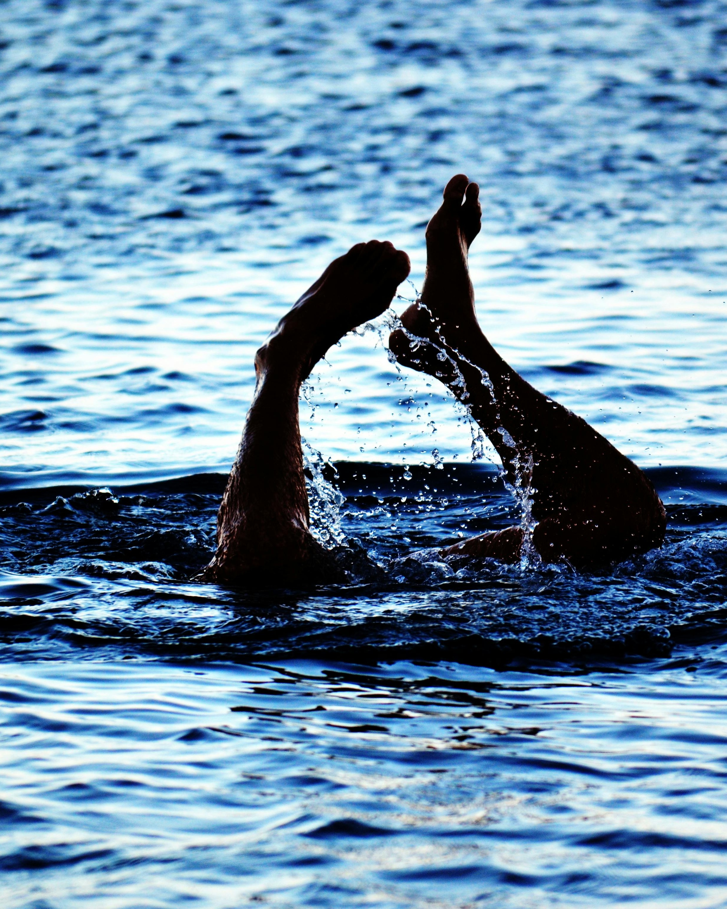 Splashing Feet Sticking Out of Water