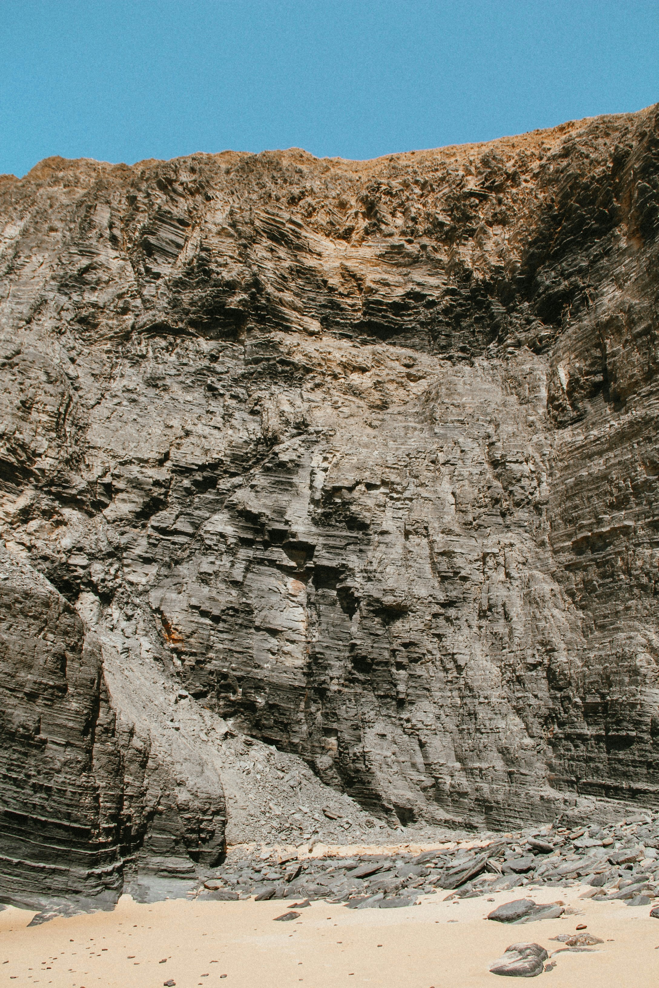 Stratified Cliff on Sandy Beach