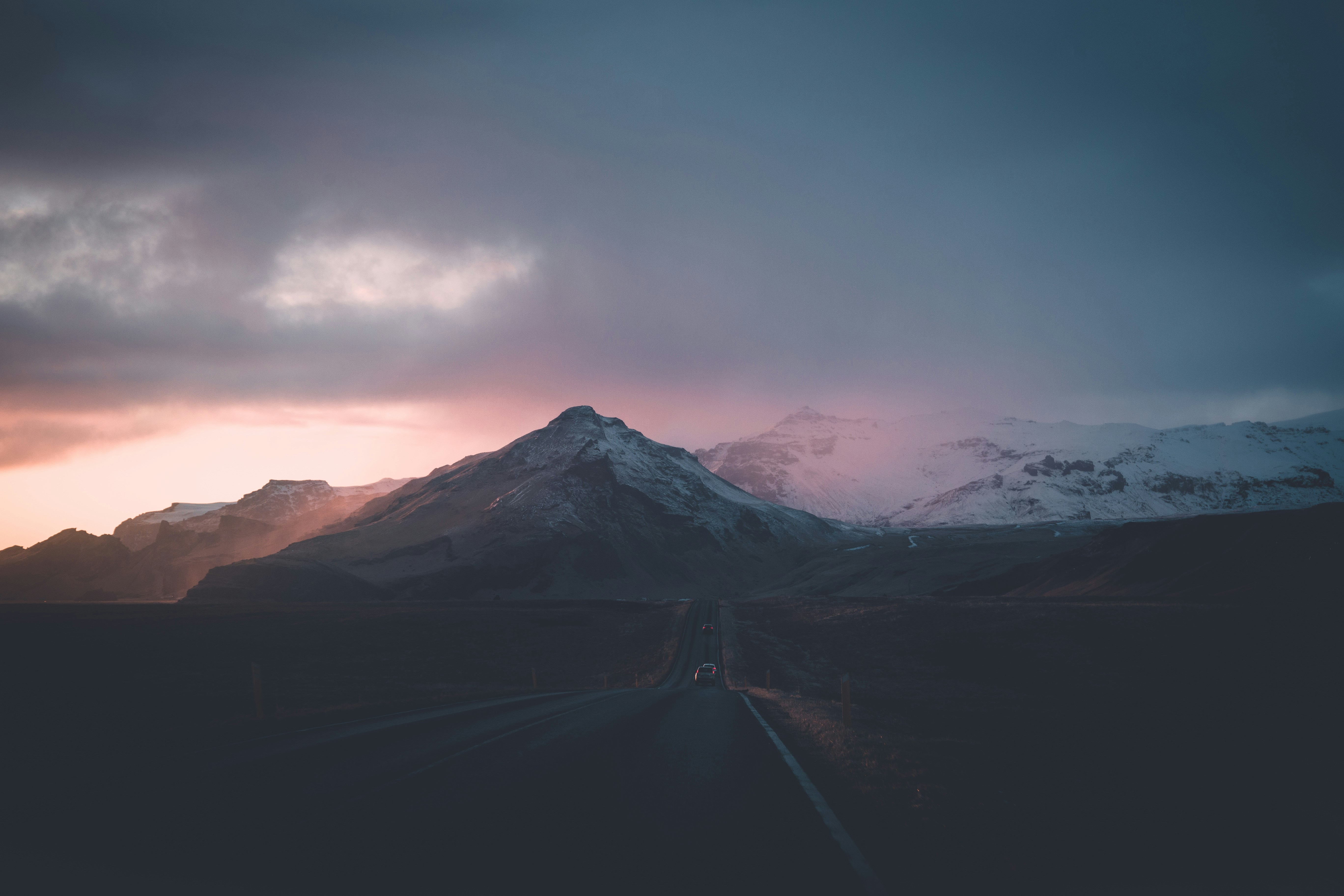 Highway to Snowy Mountains at Dusk